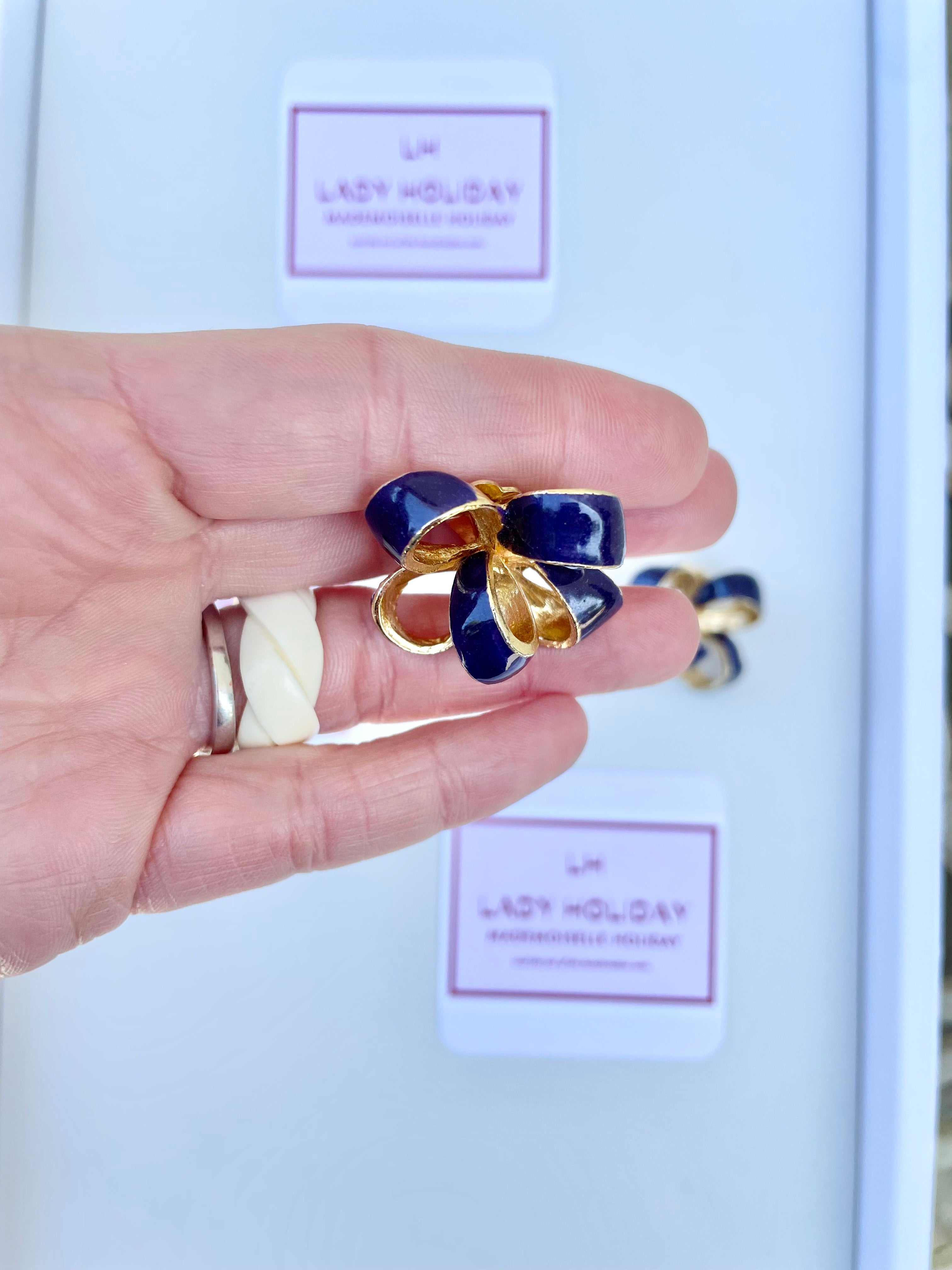 The most lovely purple bow earrings... so feminine!