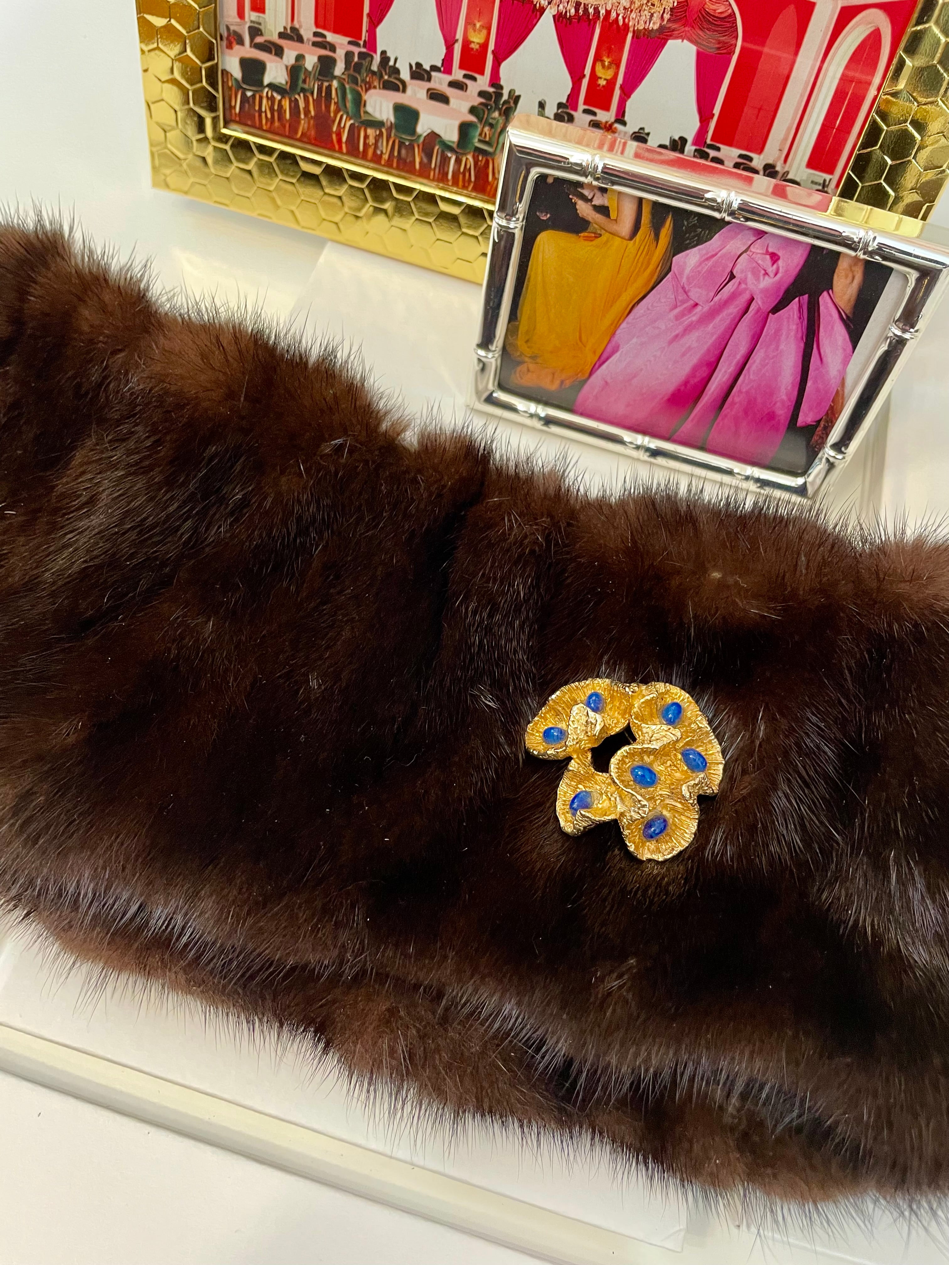 The most chic sculpted gold brooch with faux lapis stones.... so brilliant!