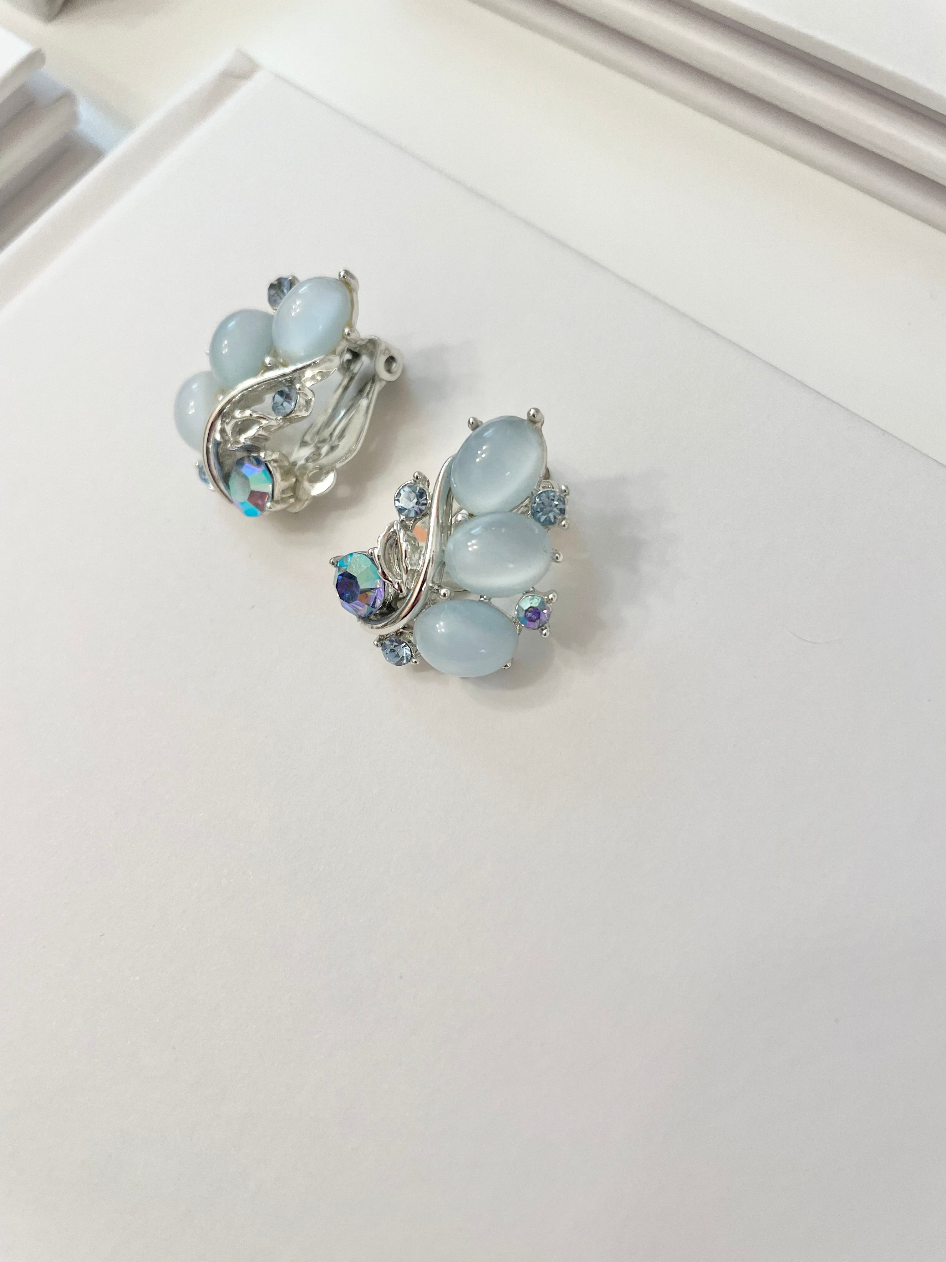 The feminine delights that are these Lisner soft blue moon glow earrings.. speak to many ladies hearts! the perfect colors..