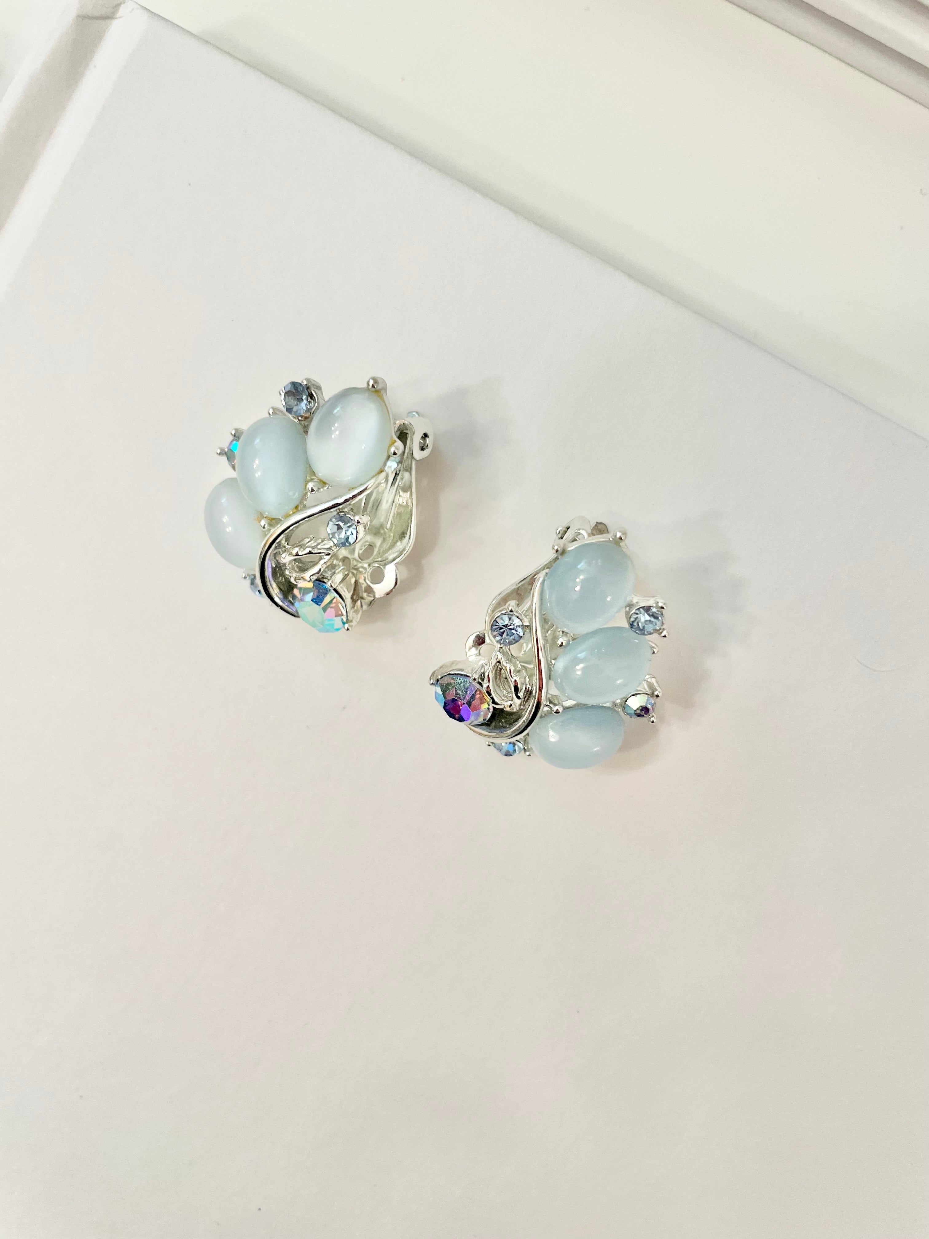 The feminine delights that are these Lisner soft blue moon glow earrings.. speak to many ladies hearts! the perfect colors..