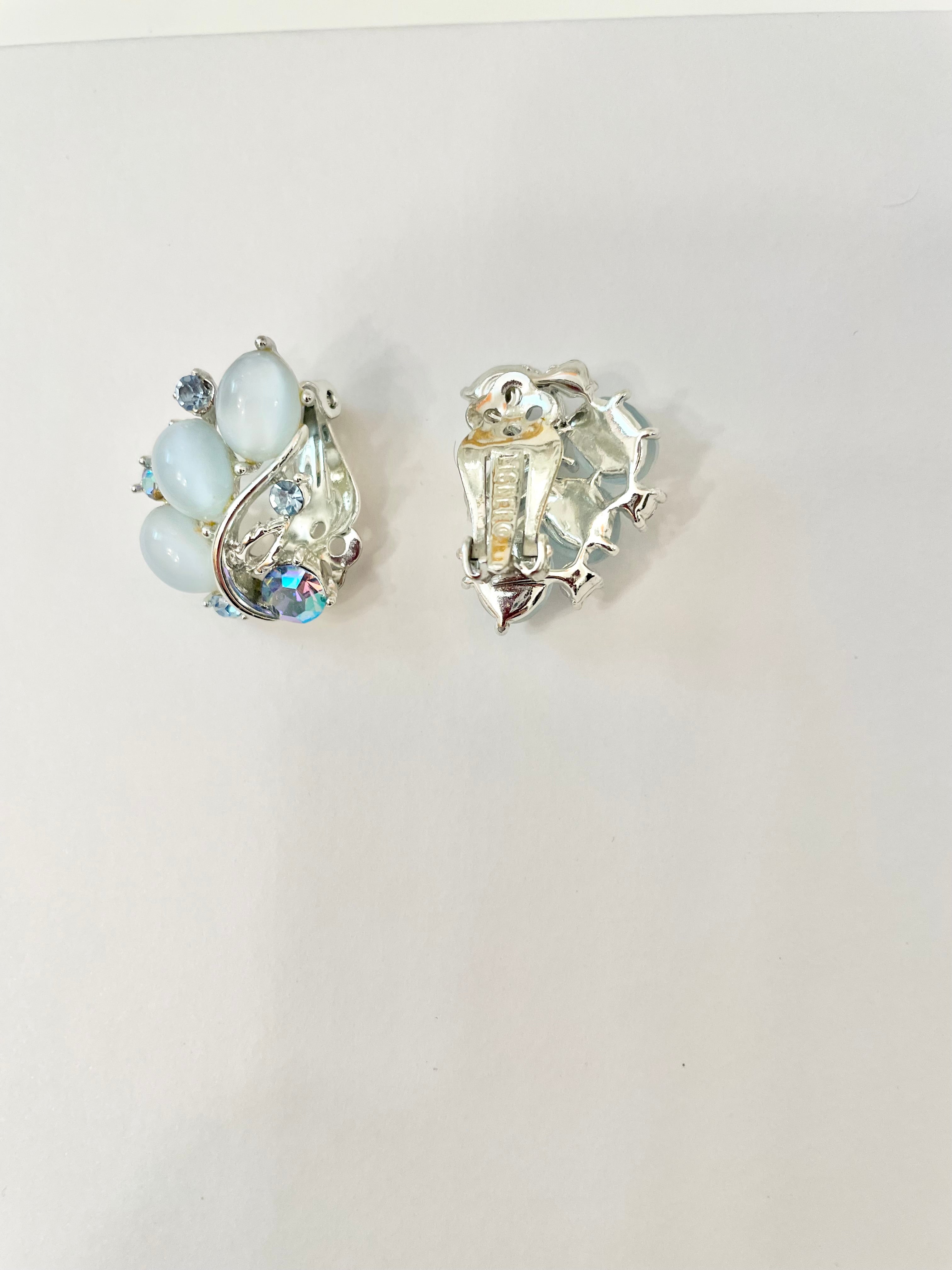 The feminine delights that are these Lisner soft blue moon glow earrings.. speak to many ladies hearts! the perfect colors..