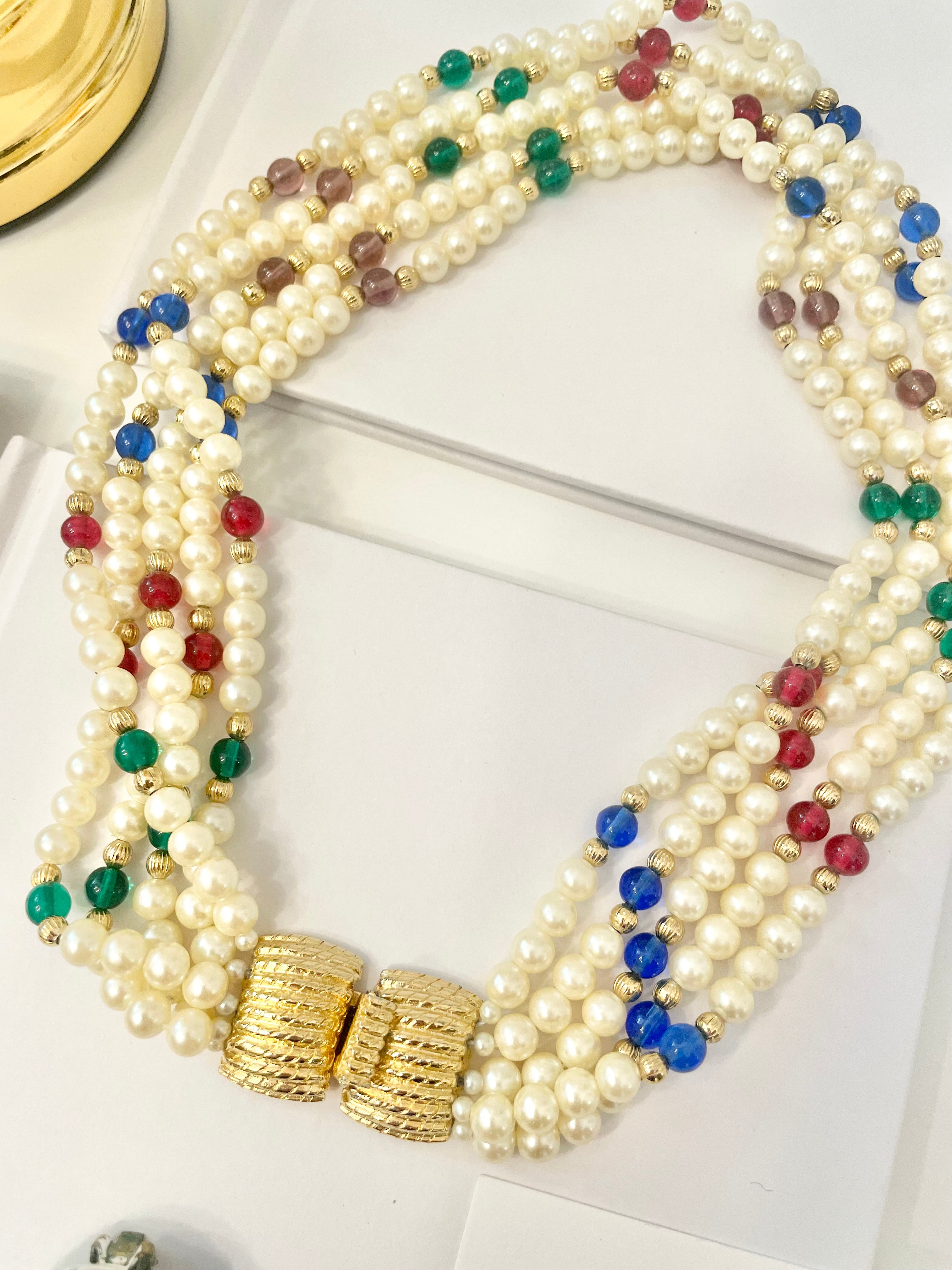 Isn't she charming... she adores anything with pearls..this 1980's super chic multi strand beaded necklace is divine!