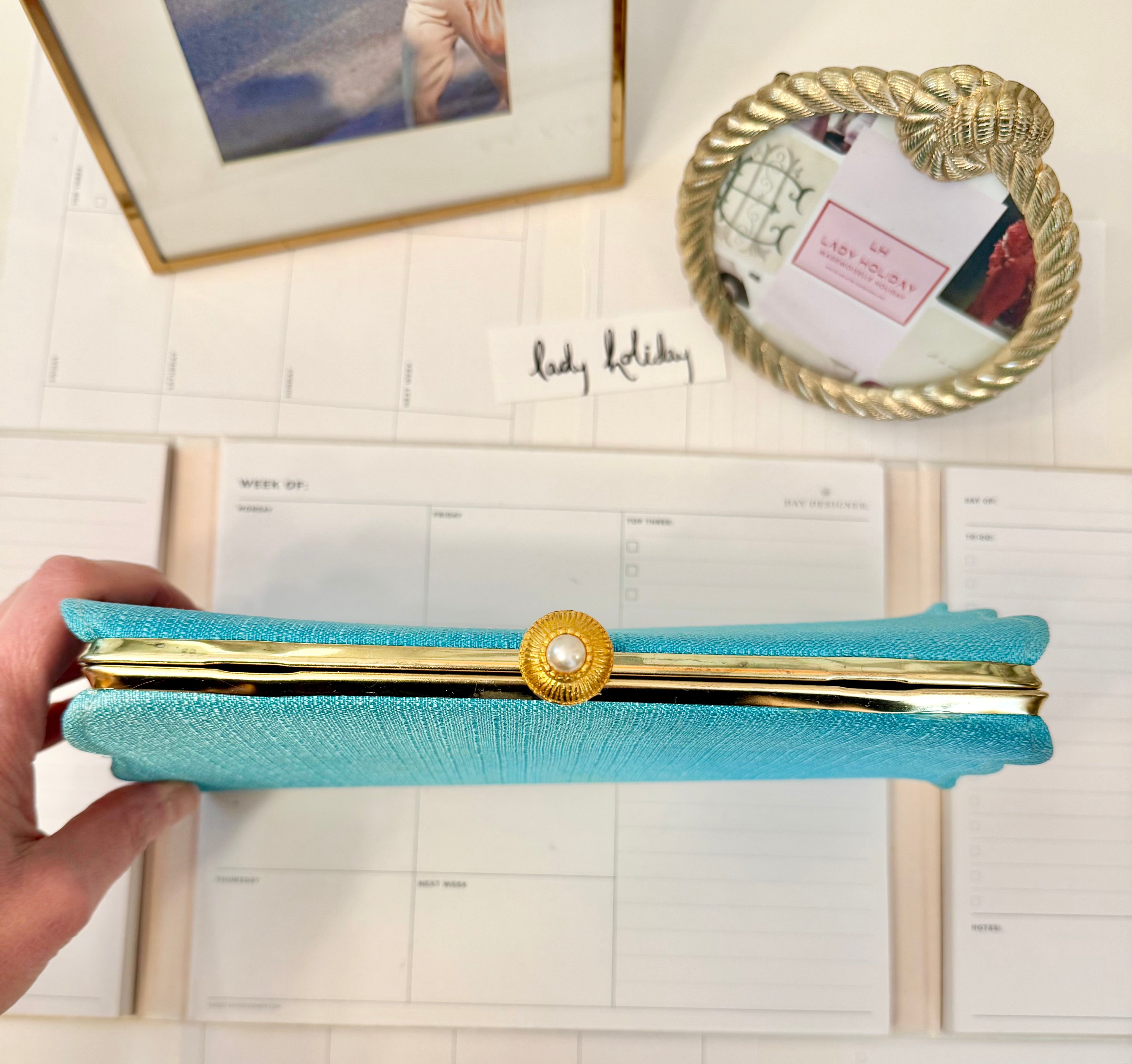 1960's super chic aqua clutch bag adorned with pearl closure... so lovely.