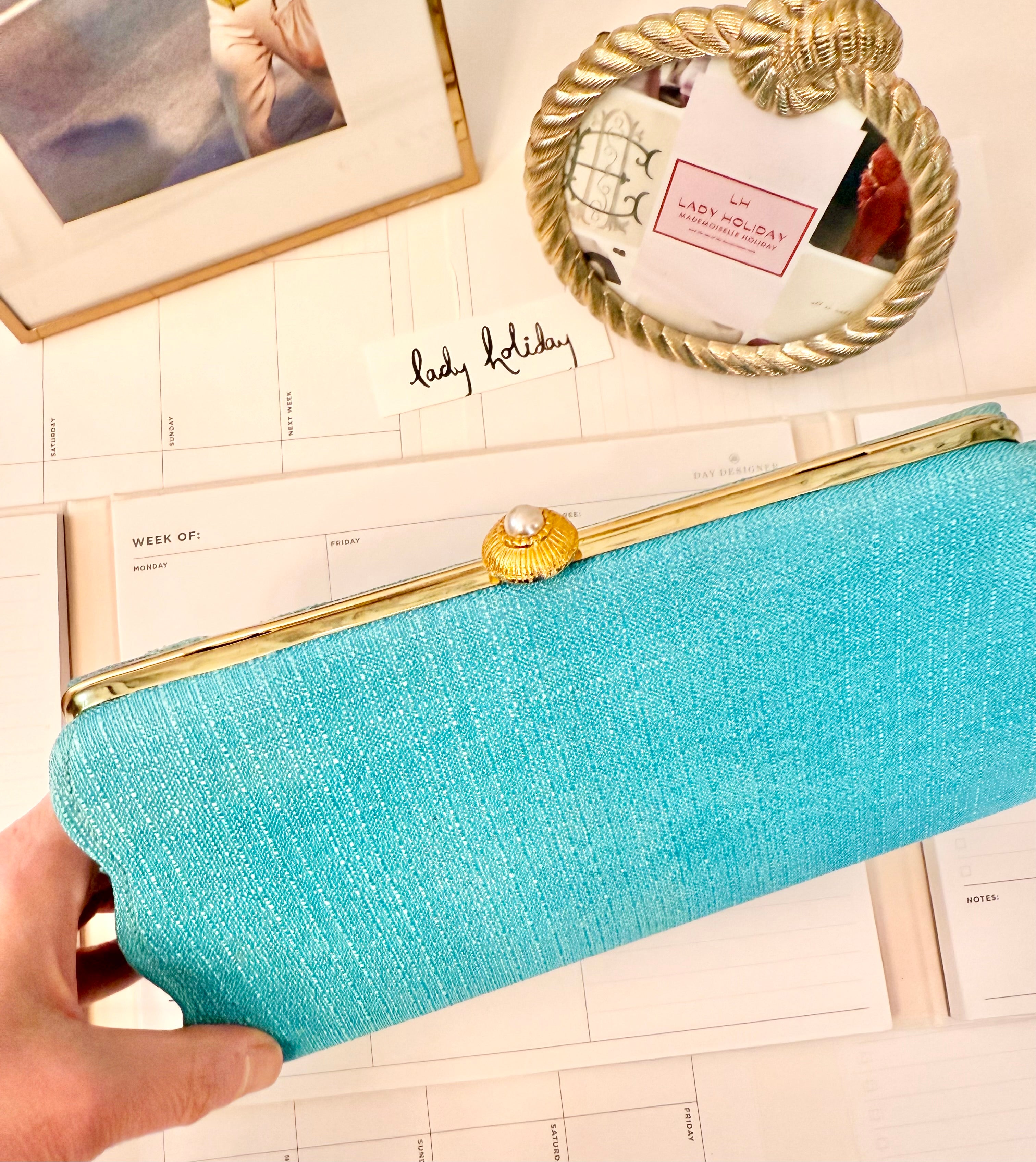 1960's super chic aqua clutch bag adorned with pearl closure... so lovely.