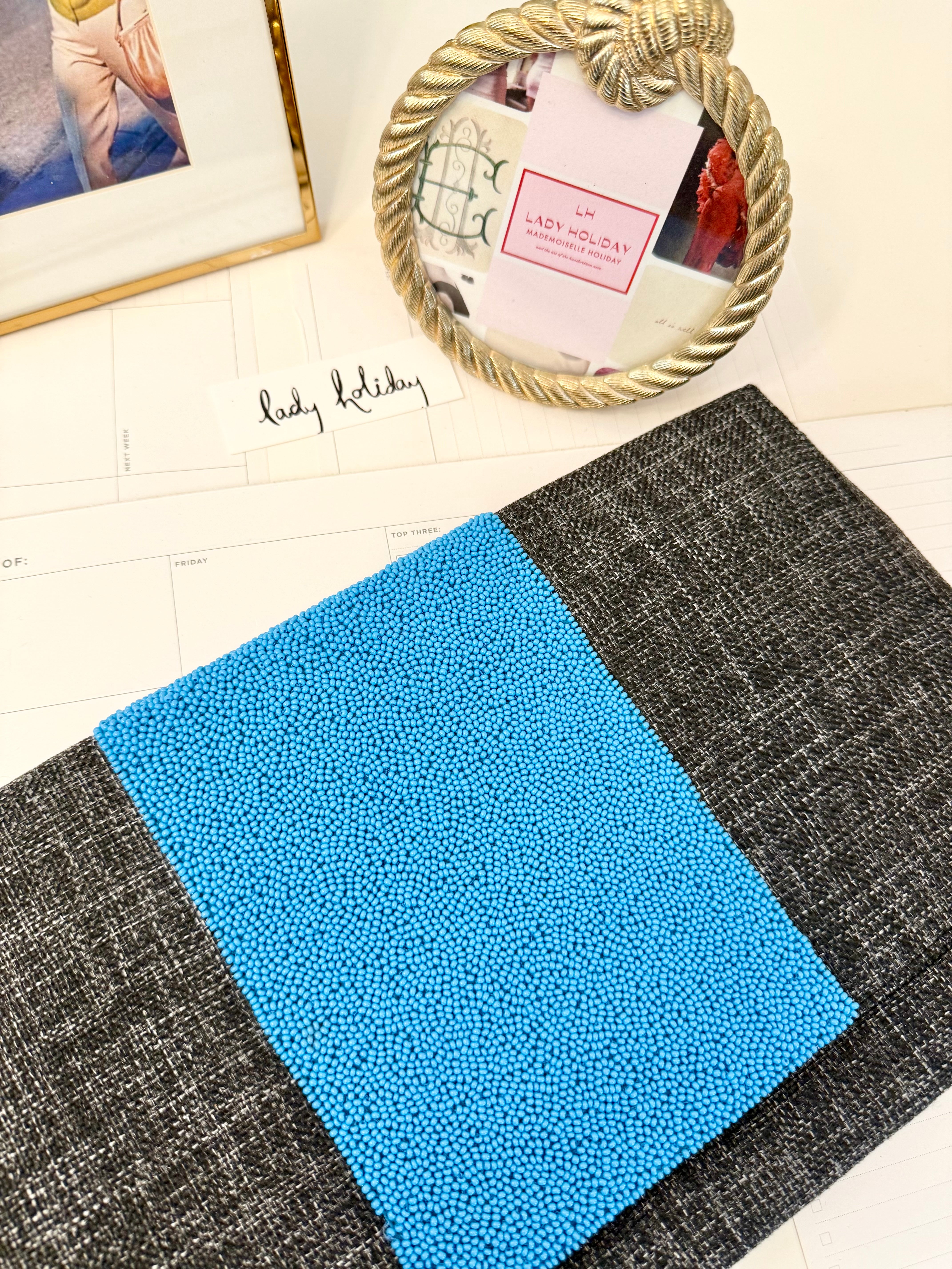 The most classy summery linen clutch adorned with blue glass beads... so feminine!