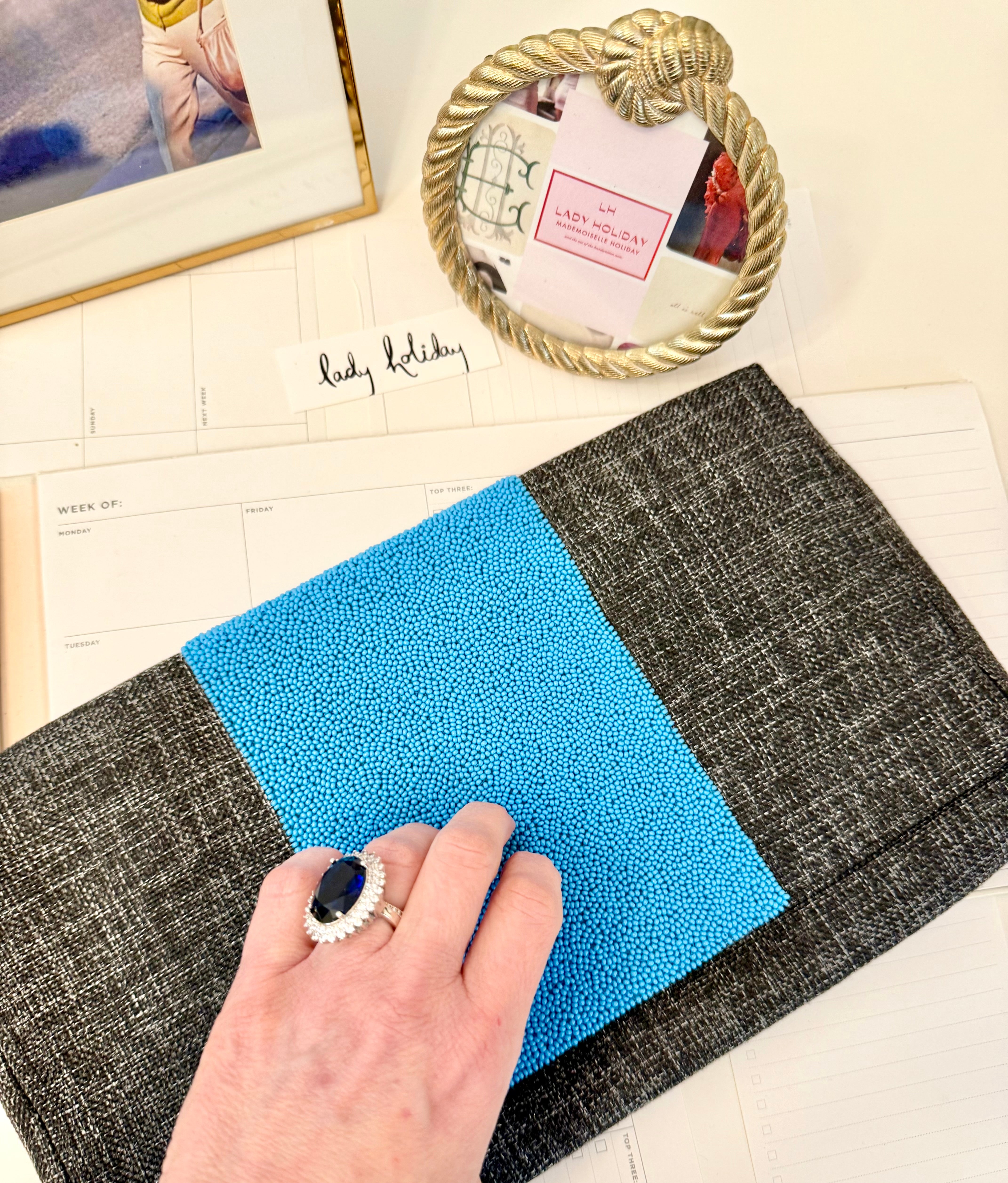 The most classy summery linen clutch adorned with blue glass beads... so feminine!