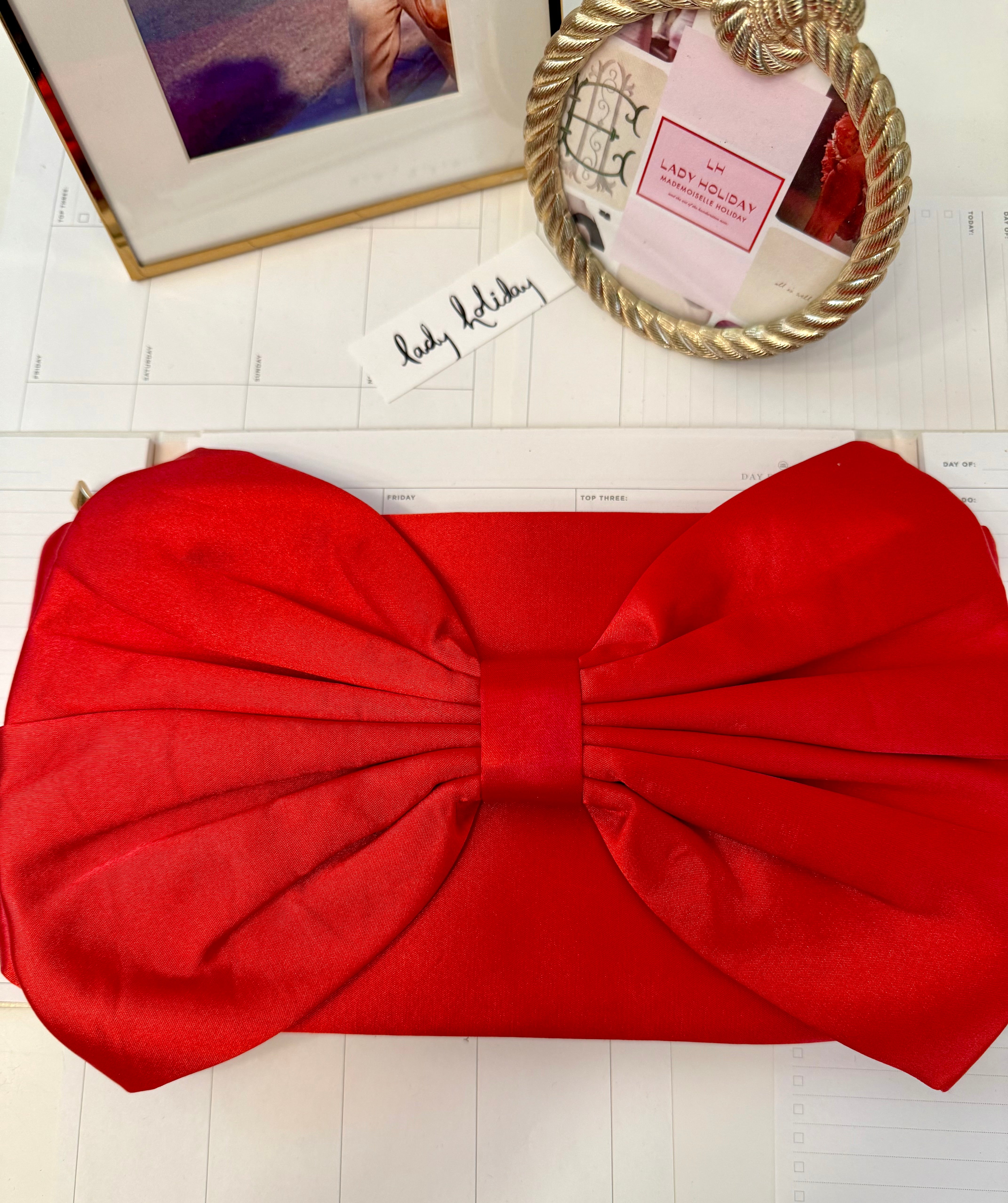 This preppy gal big bow clutch bag....so elegant