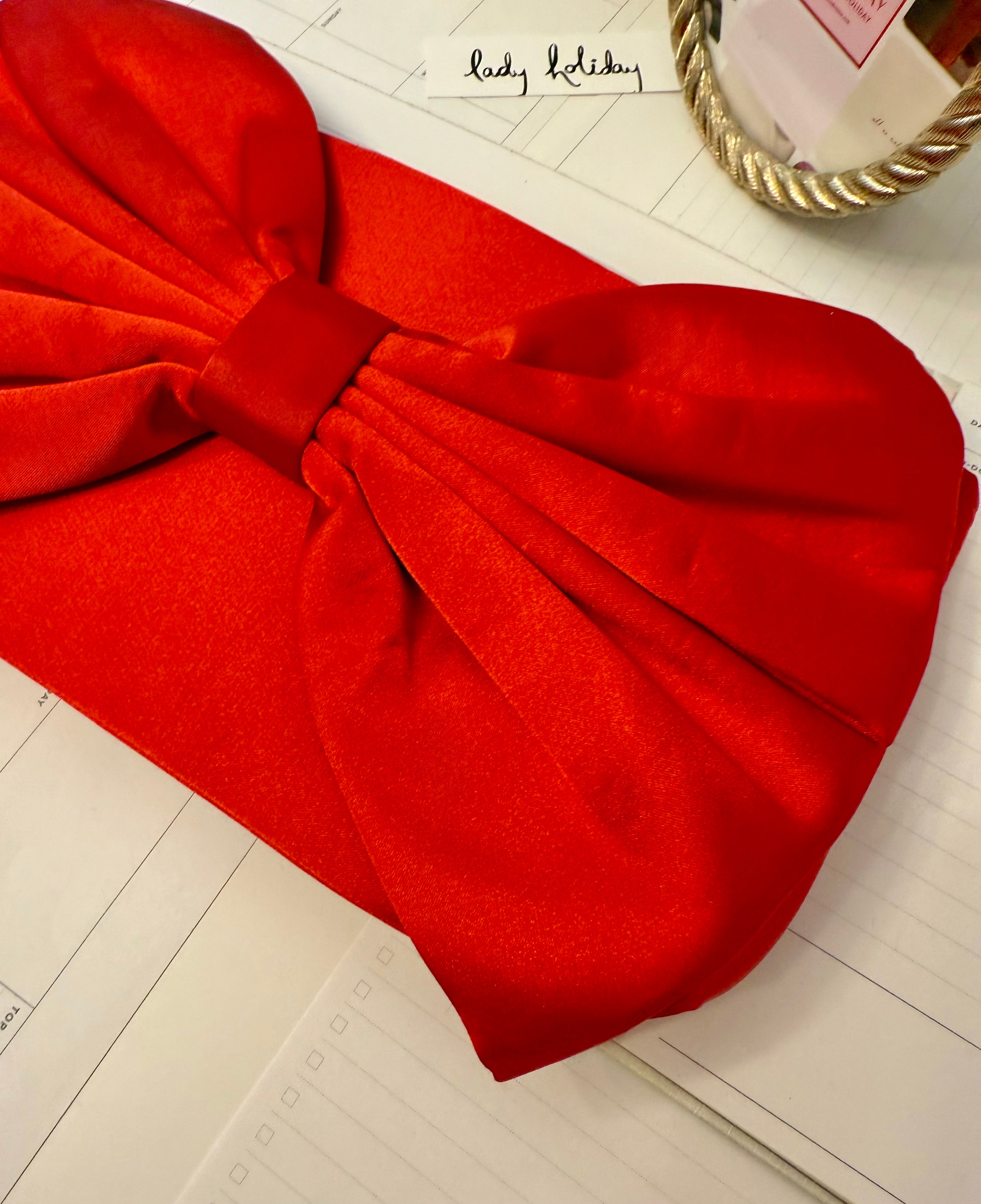 This preppy gal big bow clutch bag....so elegant