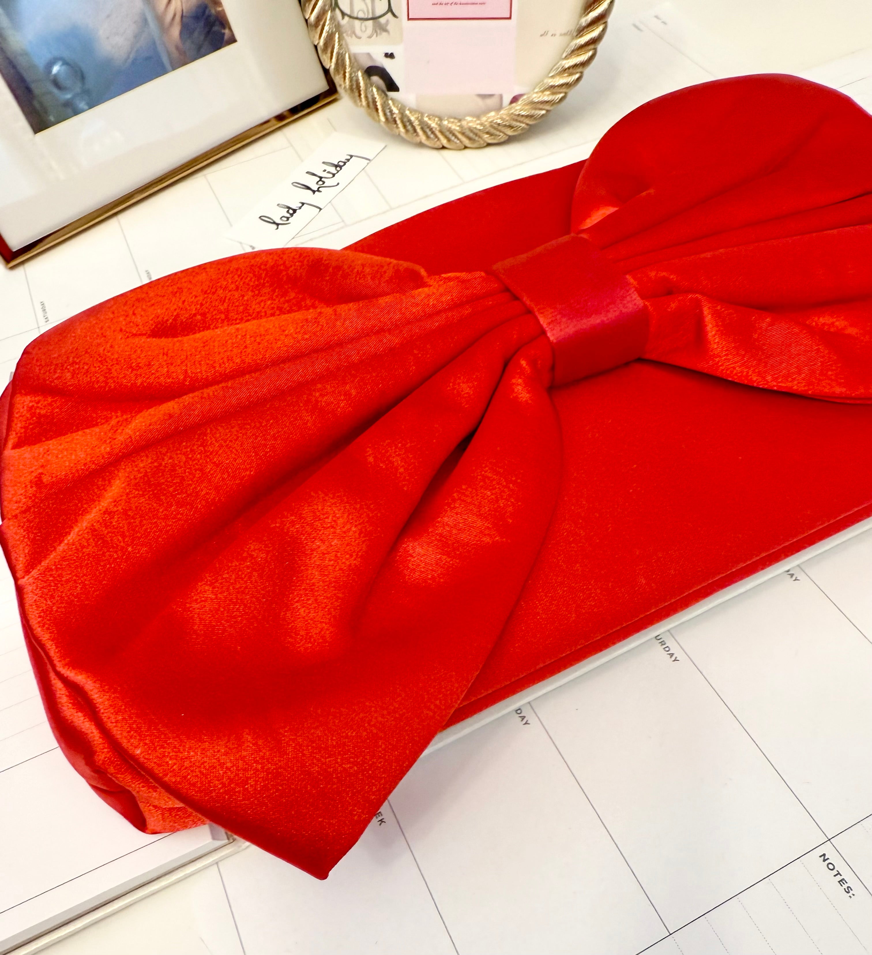 This preppy gal big bow clutch bag....so elegant