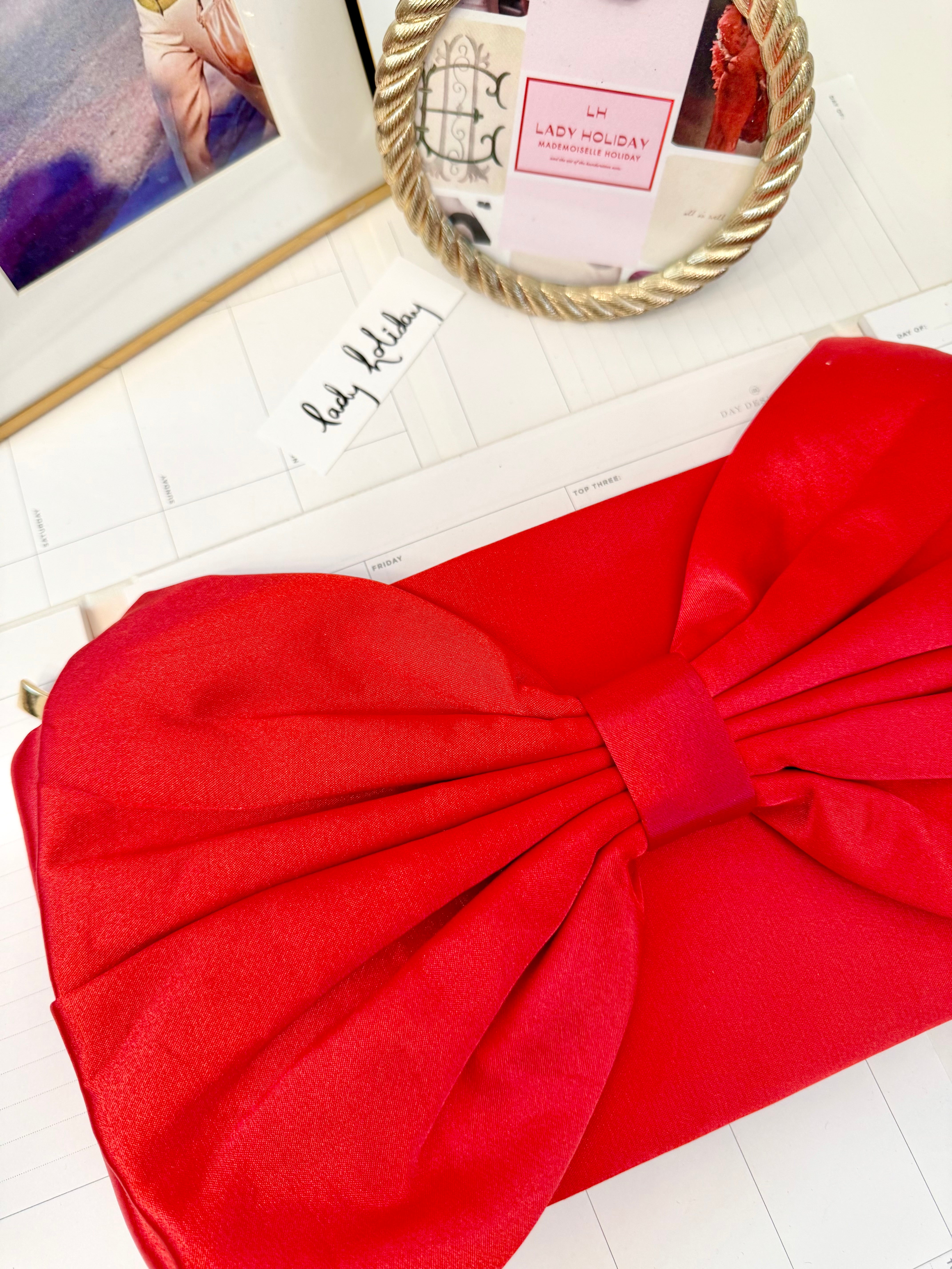 This preppy gal big bow clutch bag....so elegant