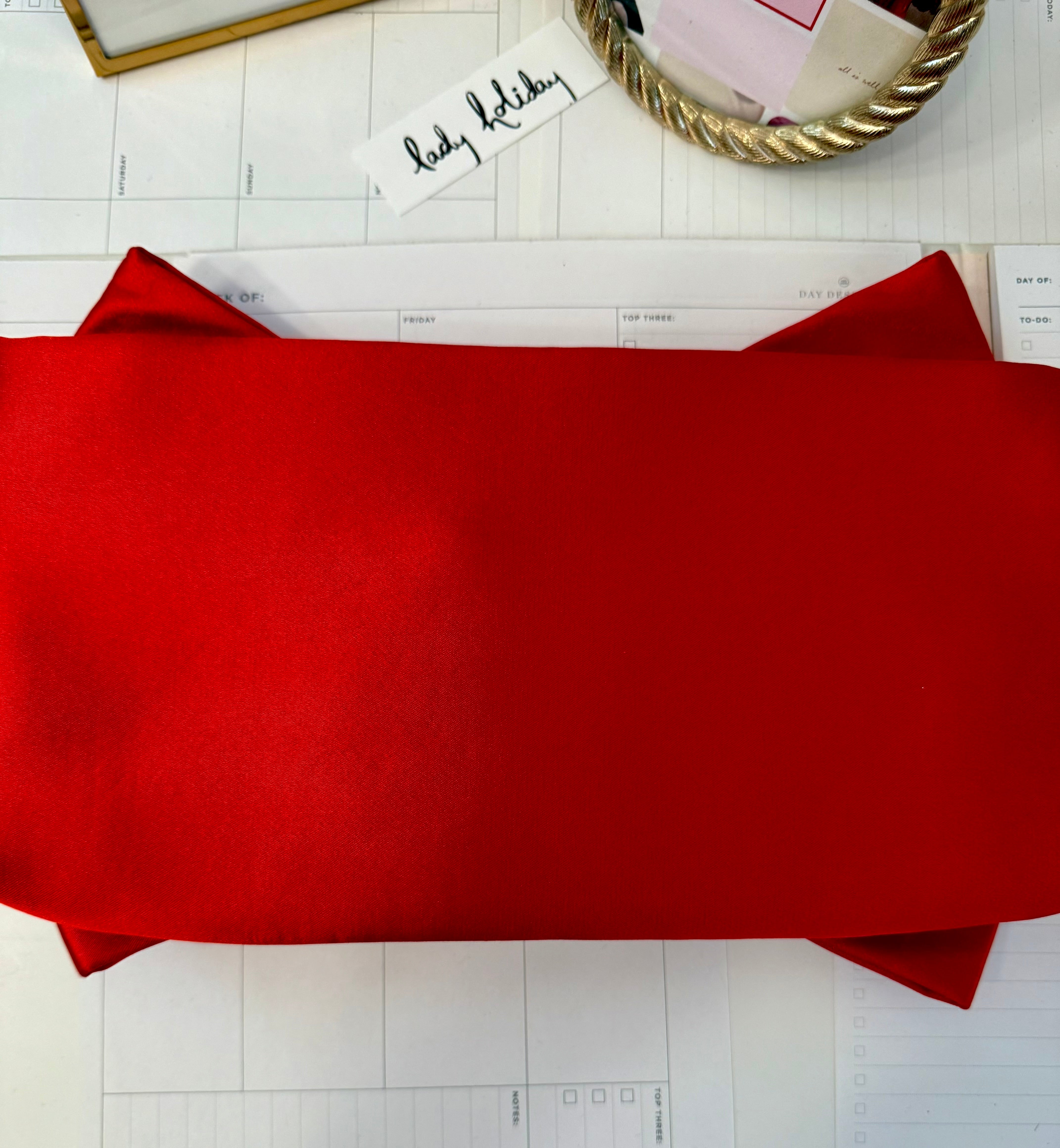 This preppy gal big bow clutch bag....so elegant