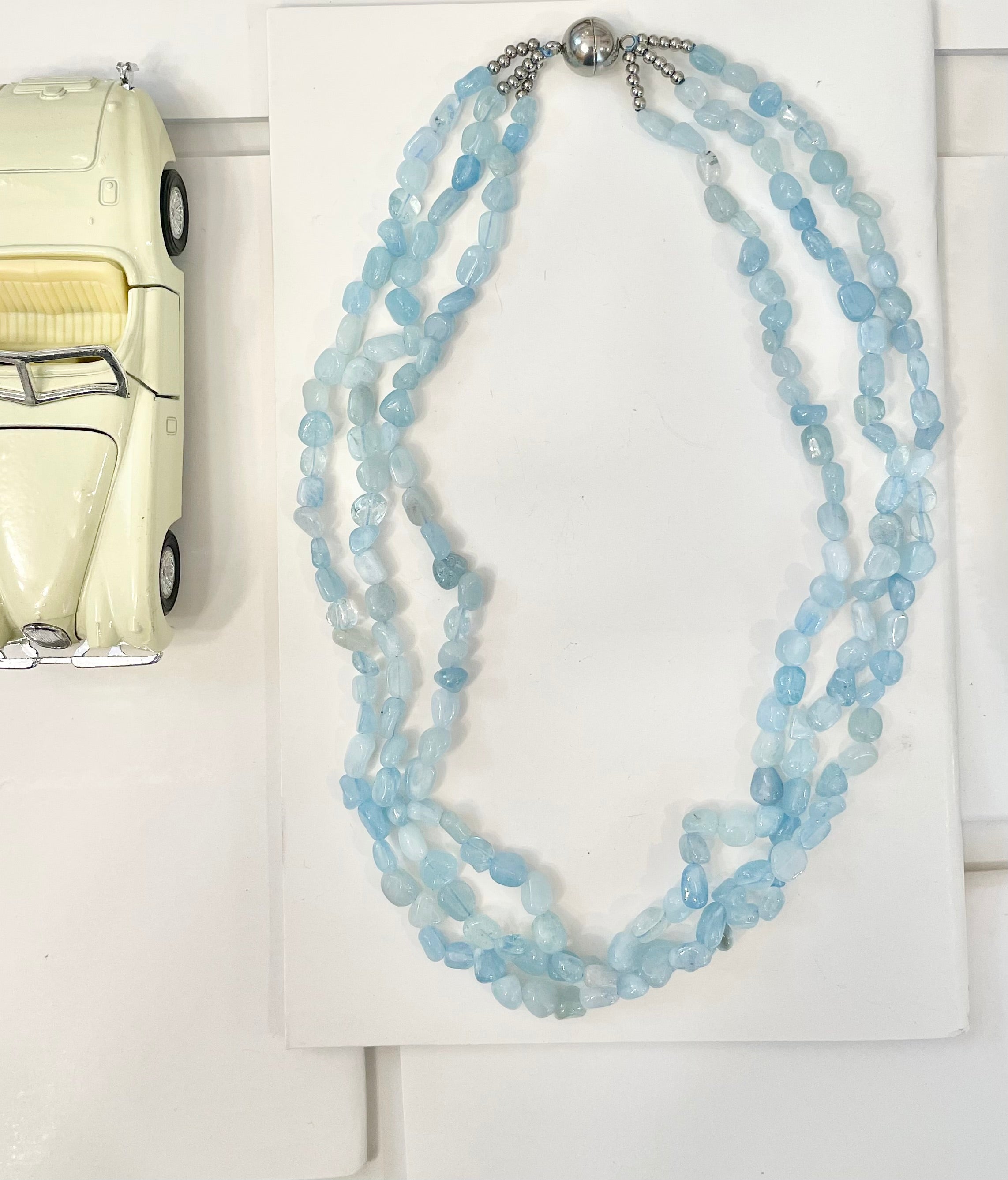 The most charming aquamarine glass beaded necklace... so feminine.