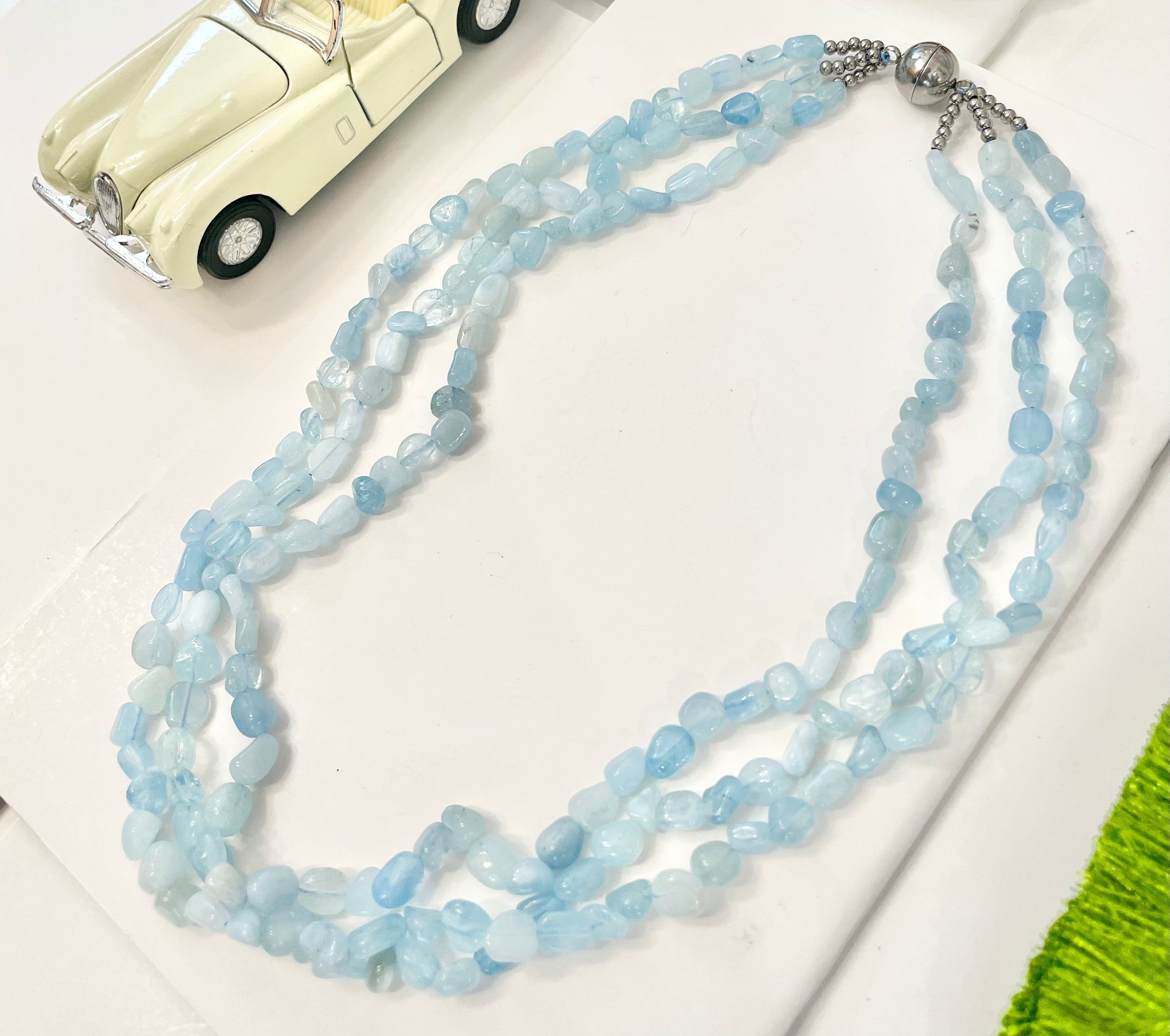 The most charming aquamarine glass beaded necklace... so feminine.