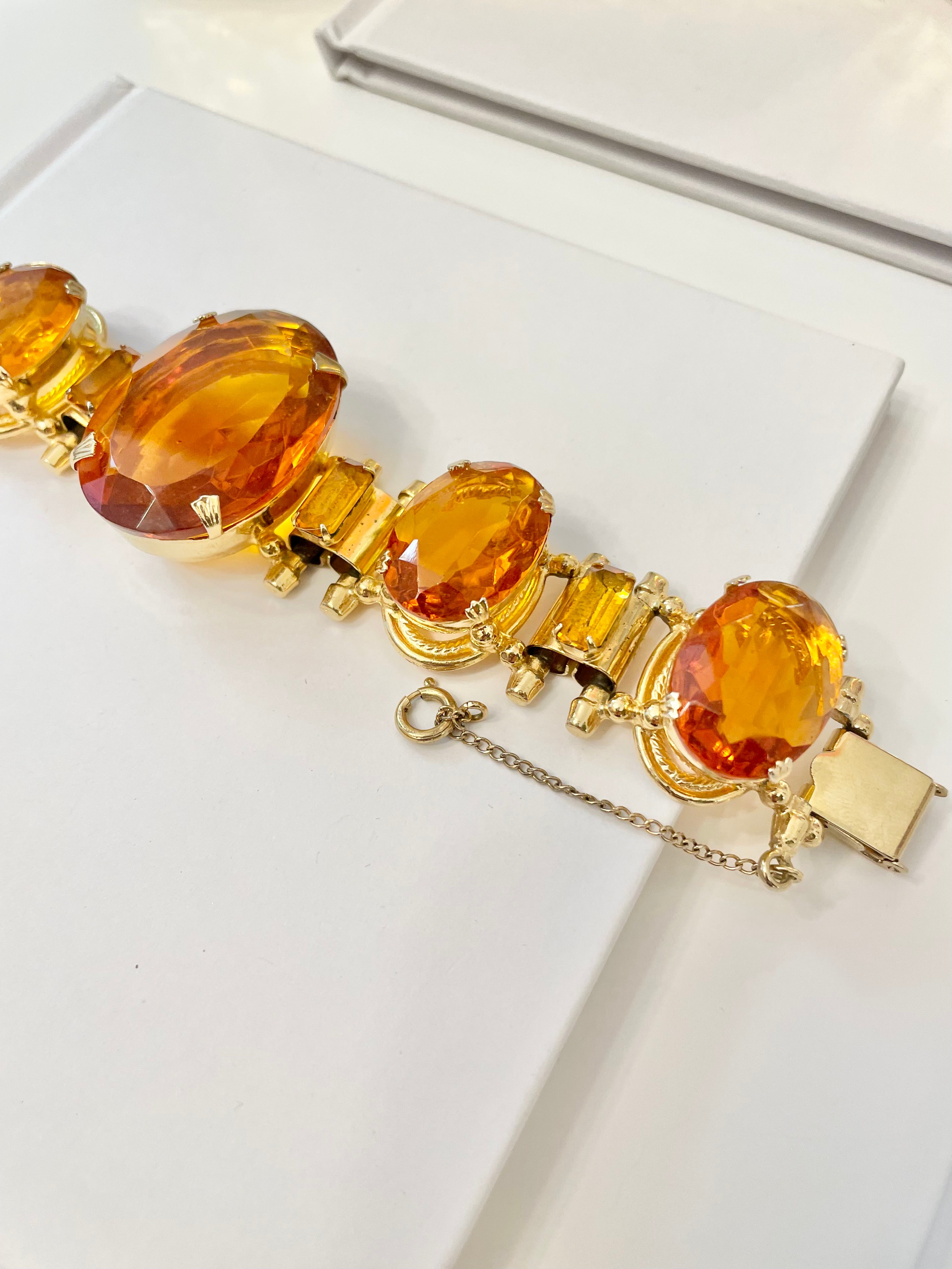 1960's stunning, and glamorous faux orange citrine glass bracelet....so elegant.