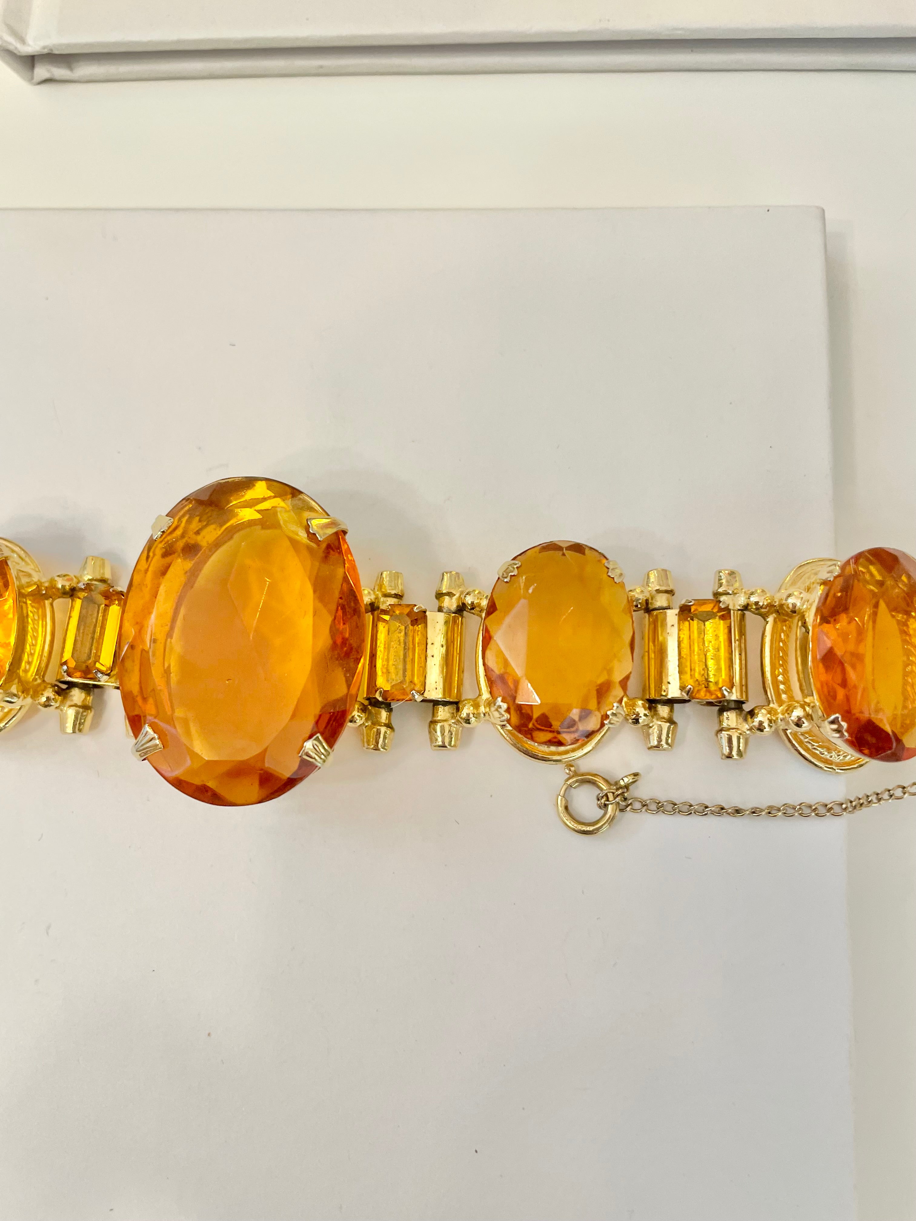 1960's stunning, and glamorous faux orange citrine glass bracelet....so elegant.