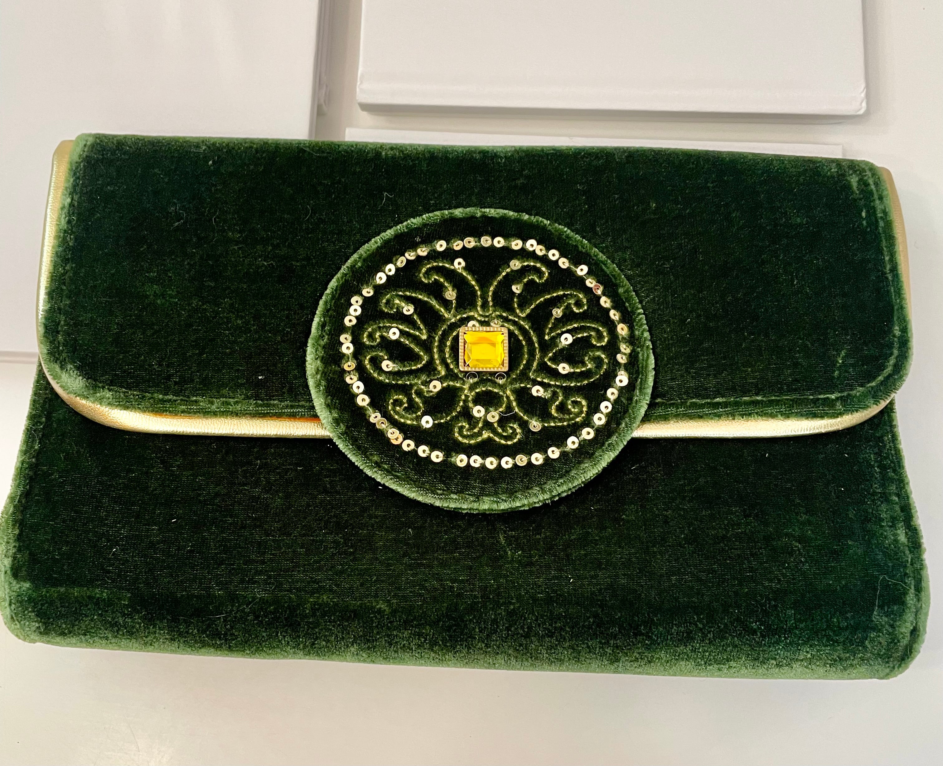 The most beautiful green velvet clutch bag, adorned with loveliest gold stone, and sequins... so elegant