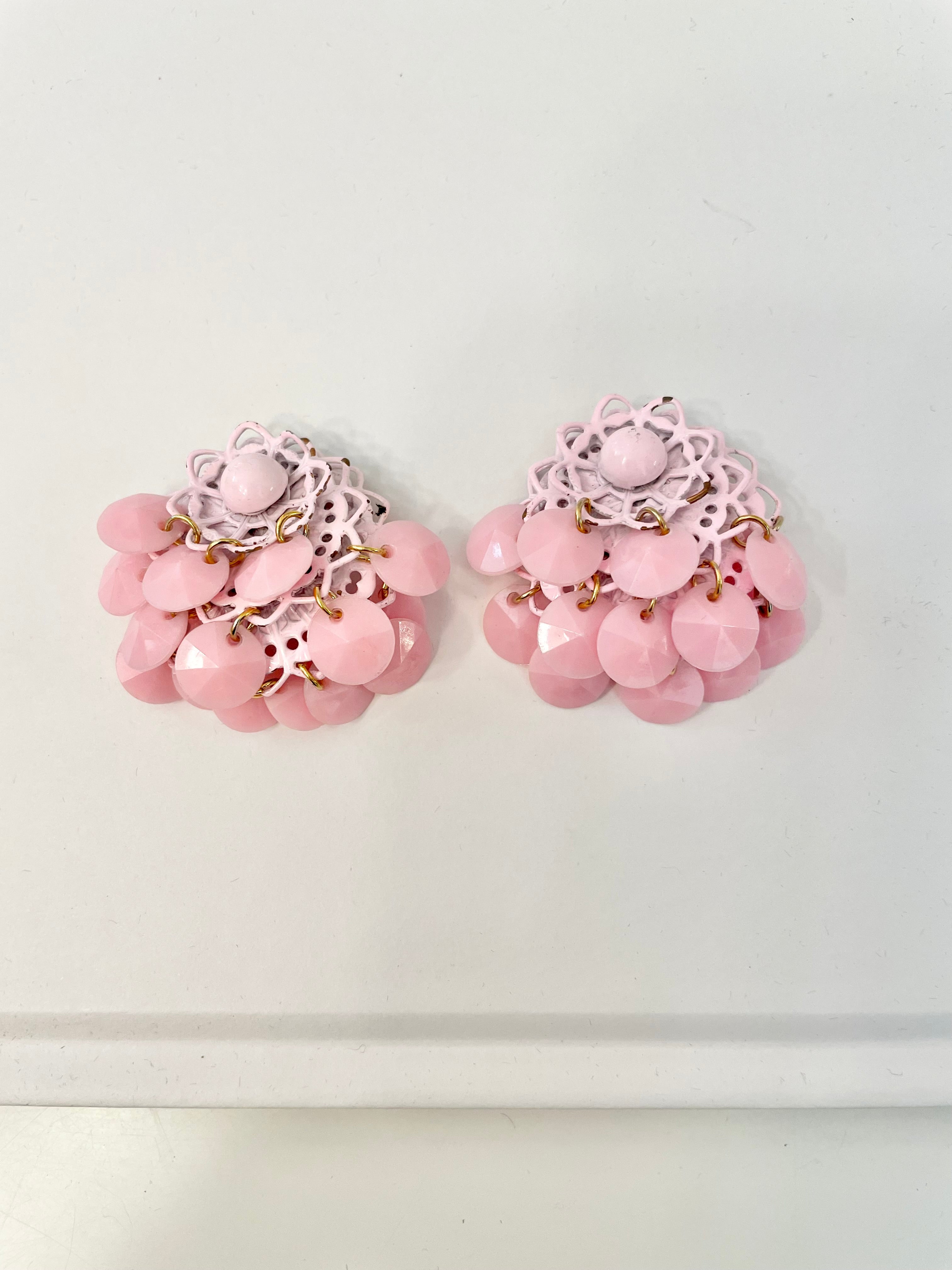 The Flirty gal and her pretty pink earrings! These are so feminine!