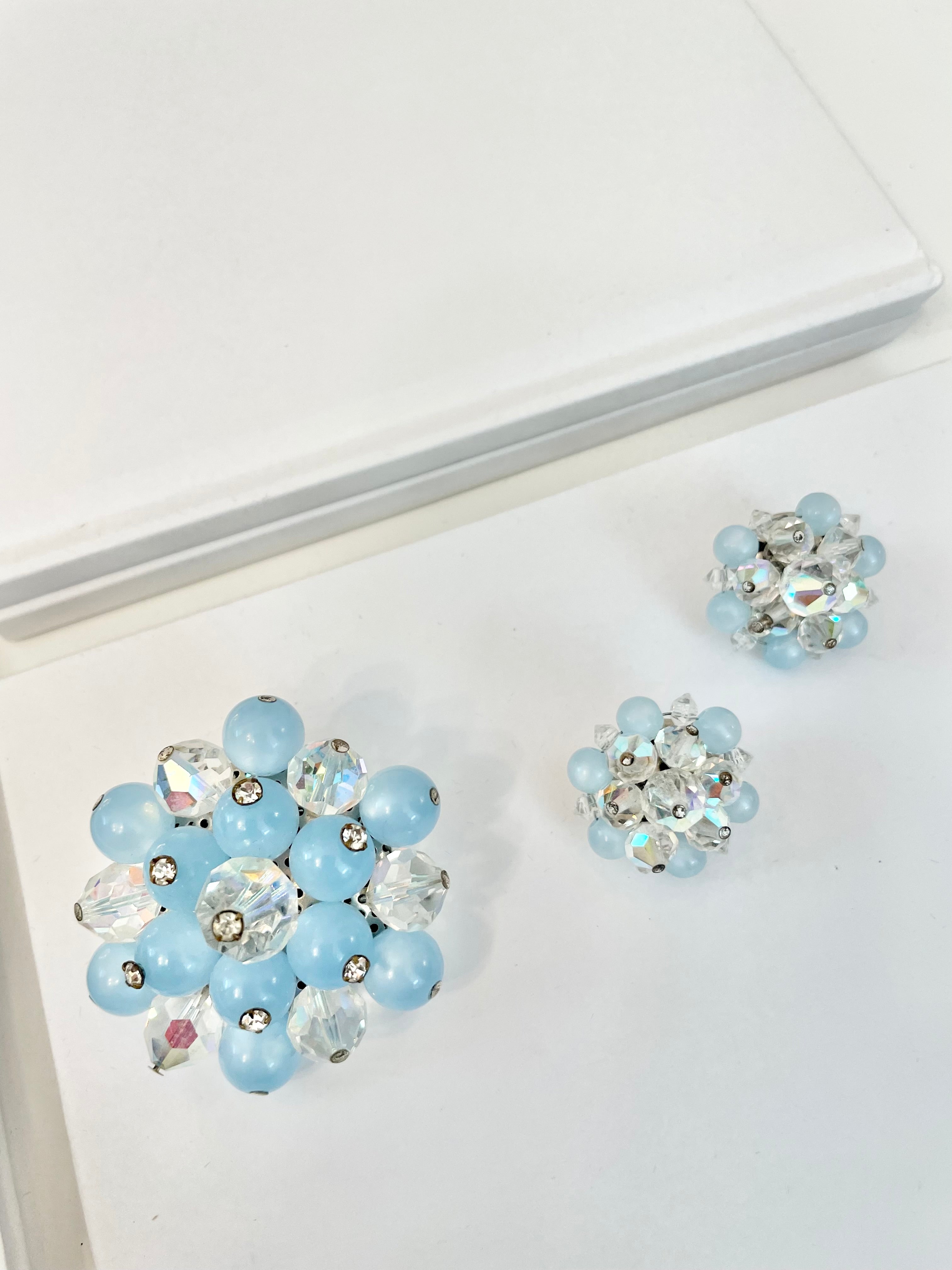 1960's Heiress and her love of the classic brooch, and matching earrings. Oh my! The soft blue with Austrian crystals is truly divine.