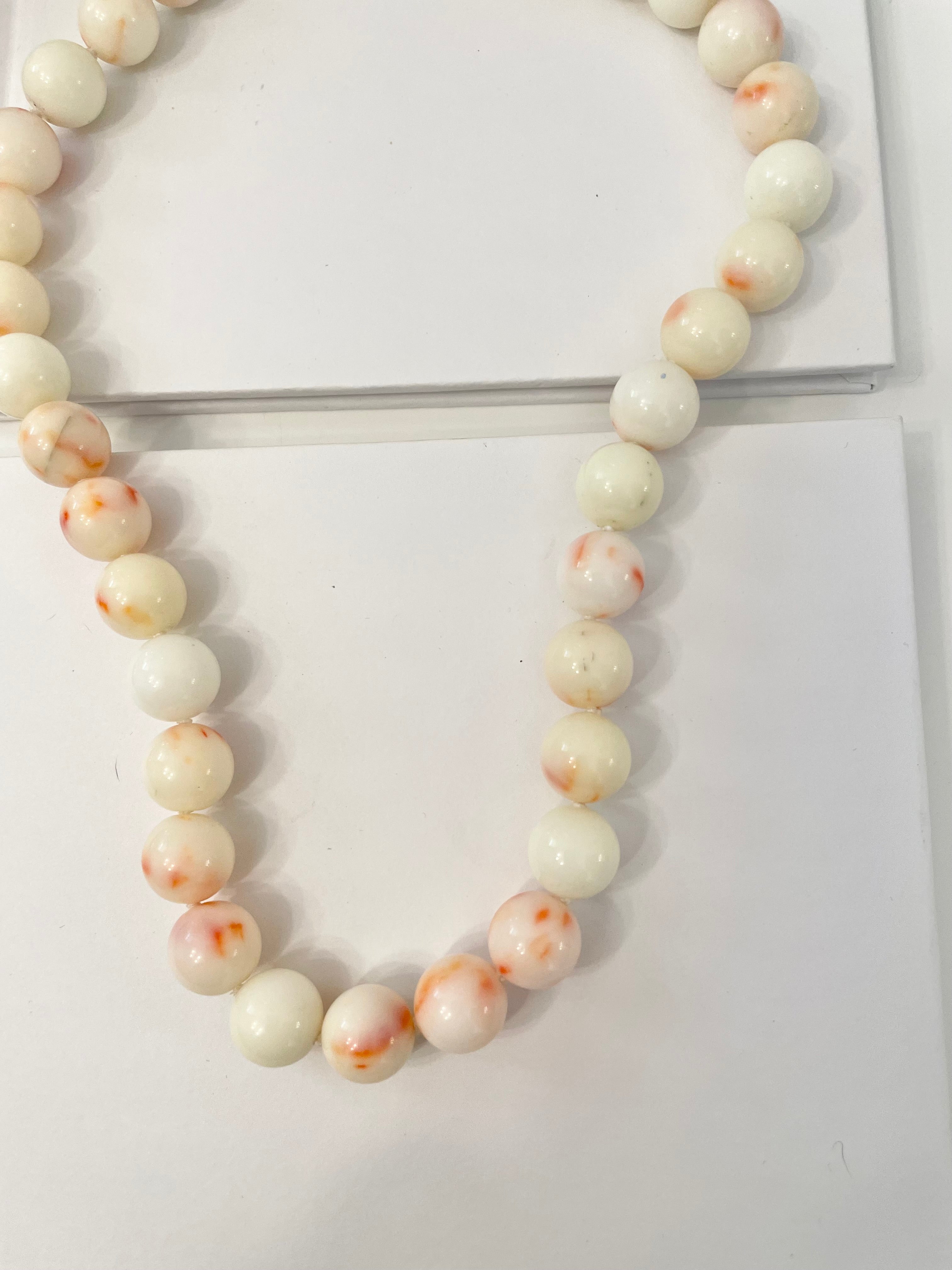 Oh so classy, faux angel skin coral lovely strand of beads... so feminine