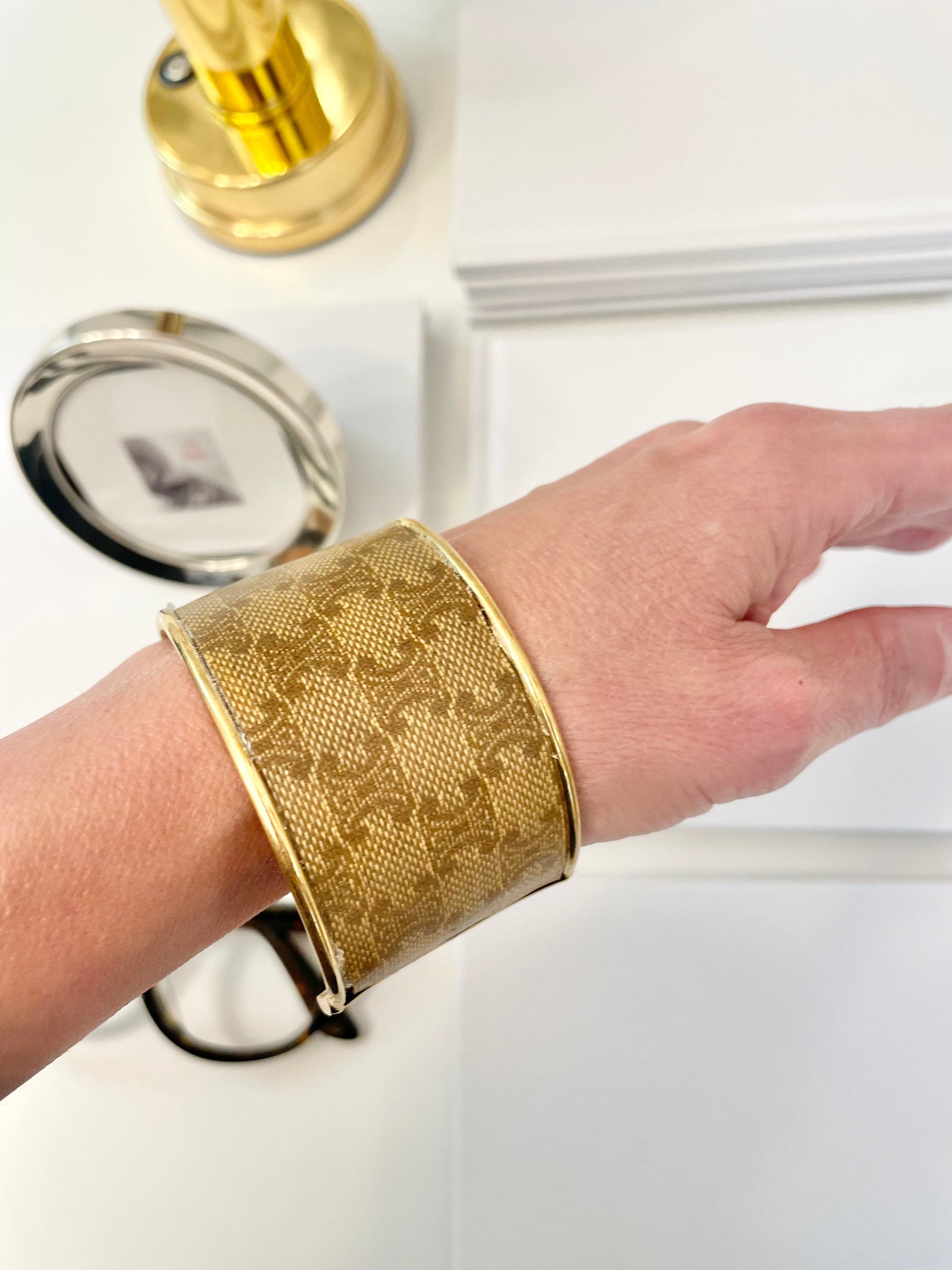 So classic...one of a kind Celine fabric cuff bracelet. So classy!