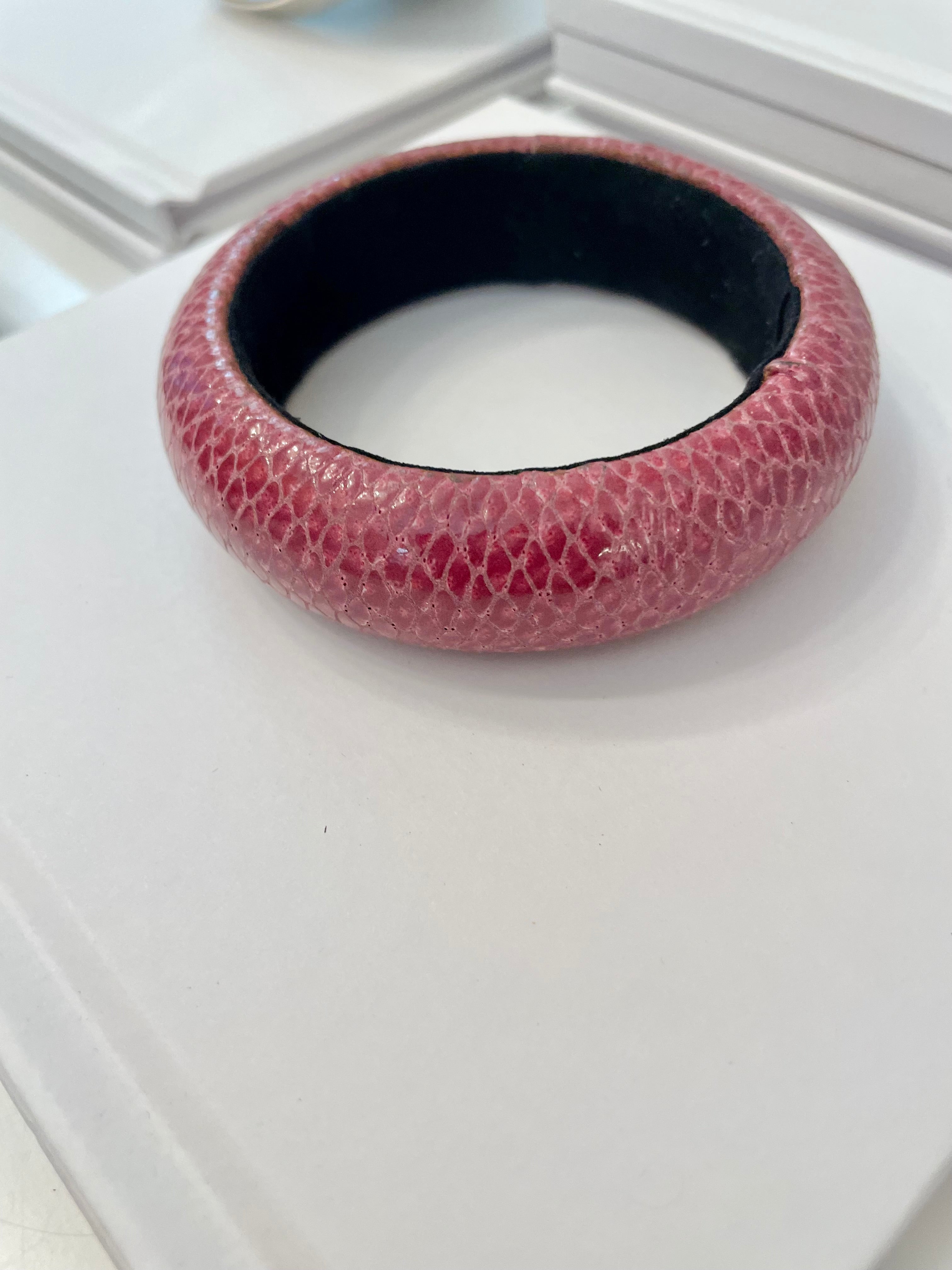 This is such a lovely 1980's faux lizard leather bangle... a truly classy piece.