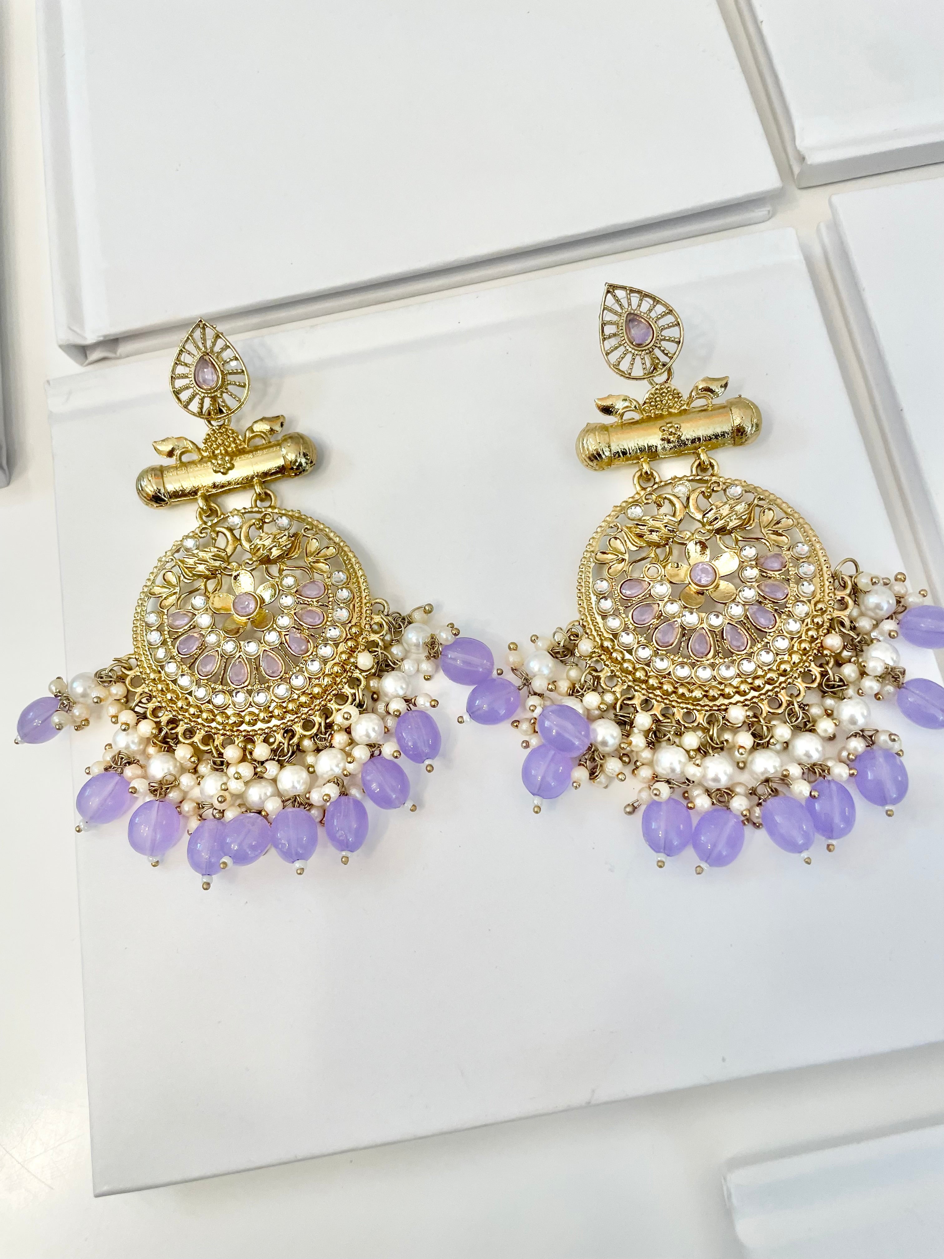 The most beautiful soft purple glass statement earrings....so feminine