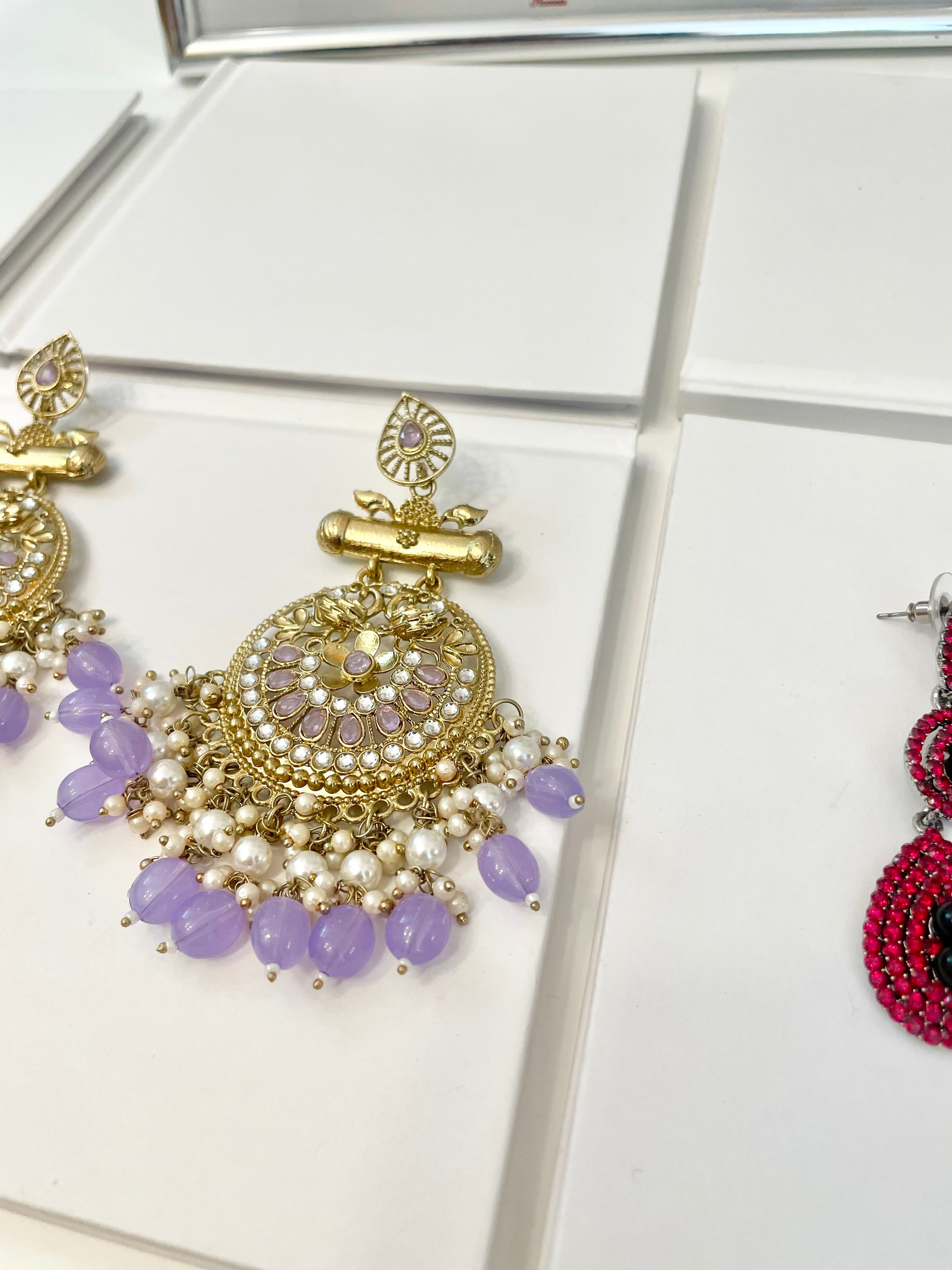 The most beautiful soft purple glass statement earrings....so feminine