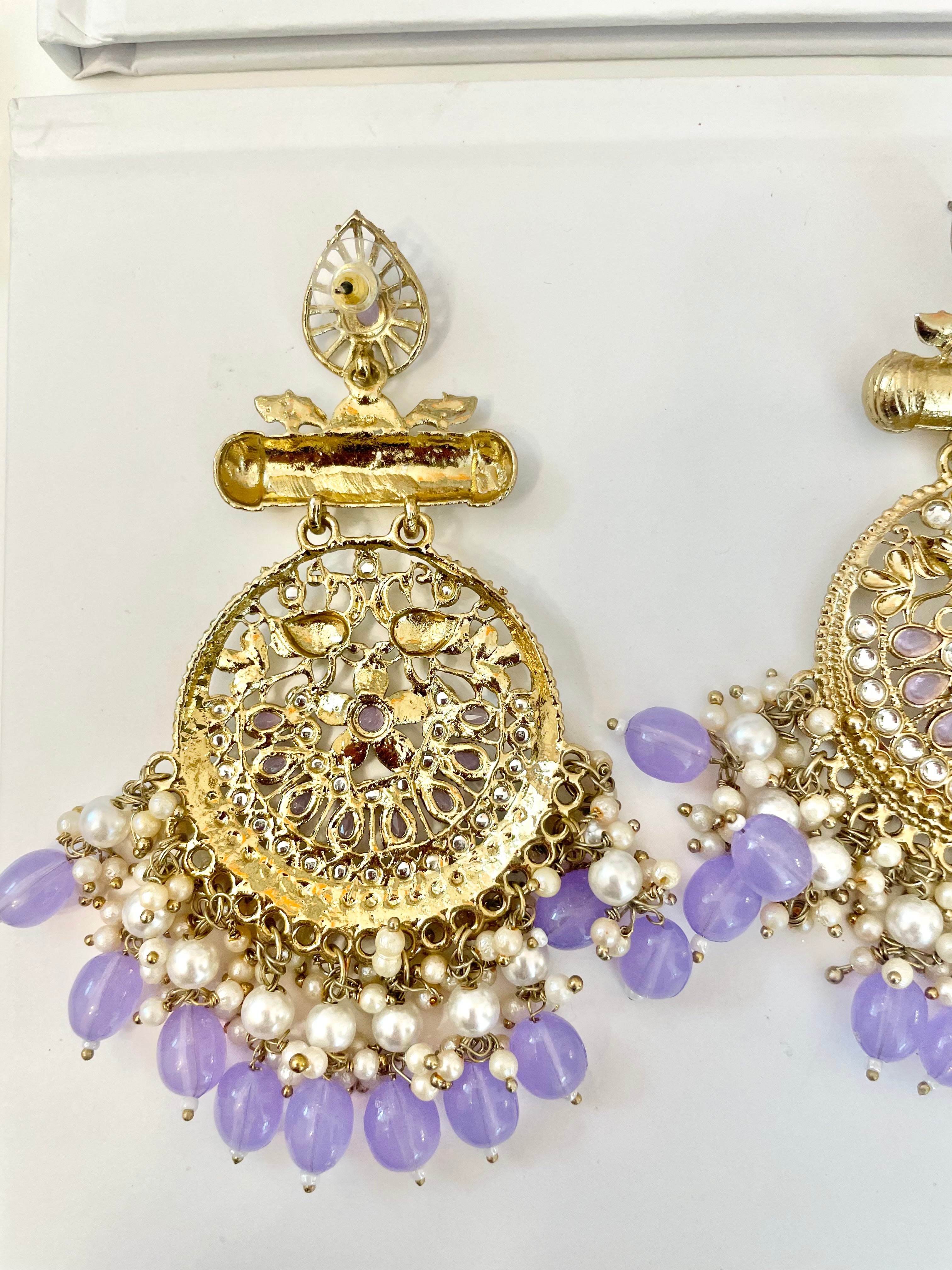 The most beautiful soft purple glass statement earrings....so feminine