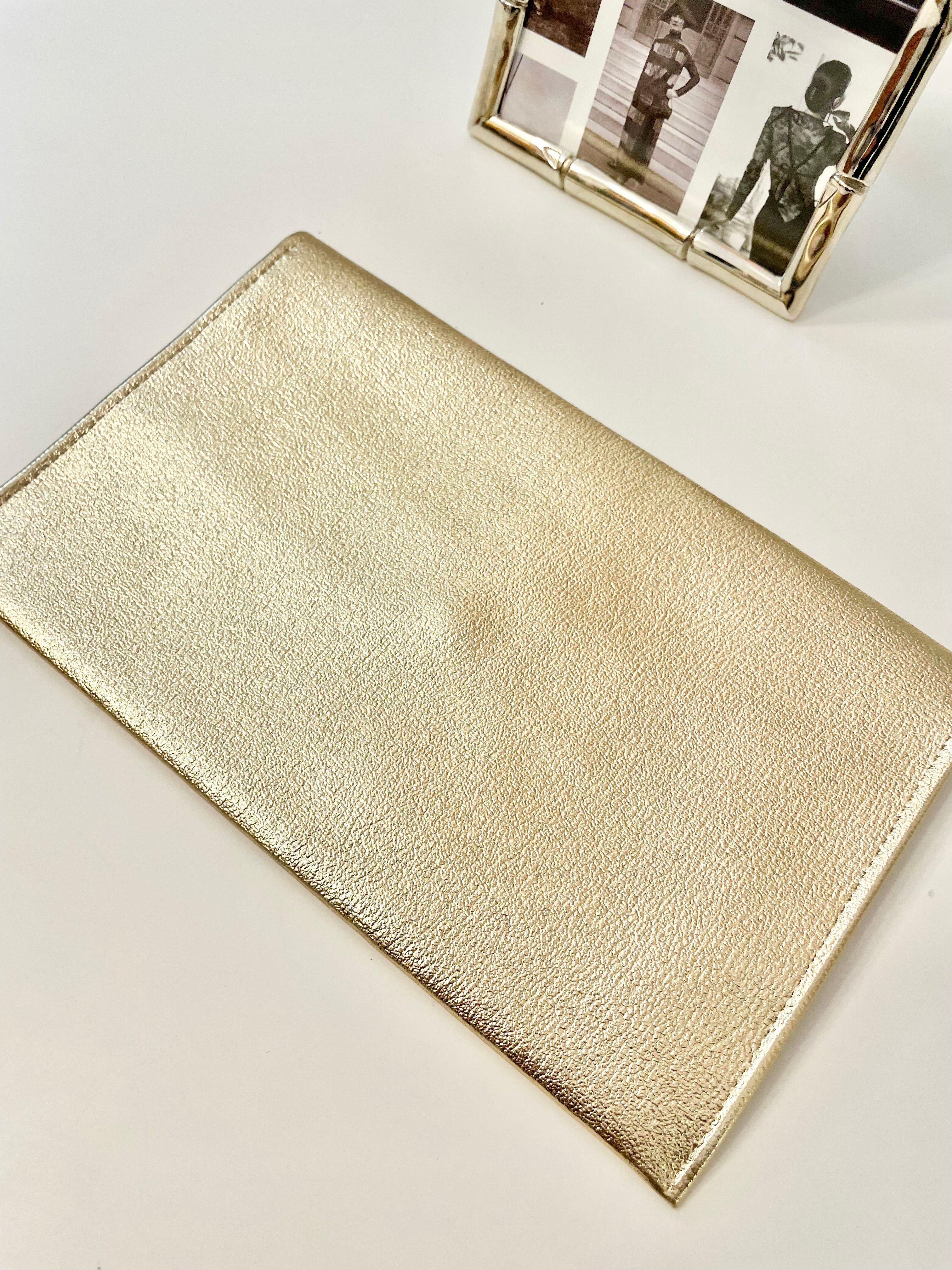 1960's sassy petite gold clutch bag with lovely gold adornment...