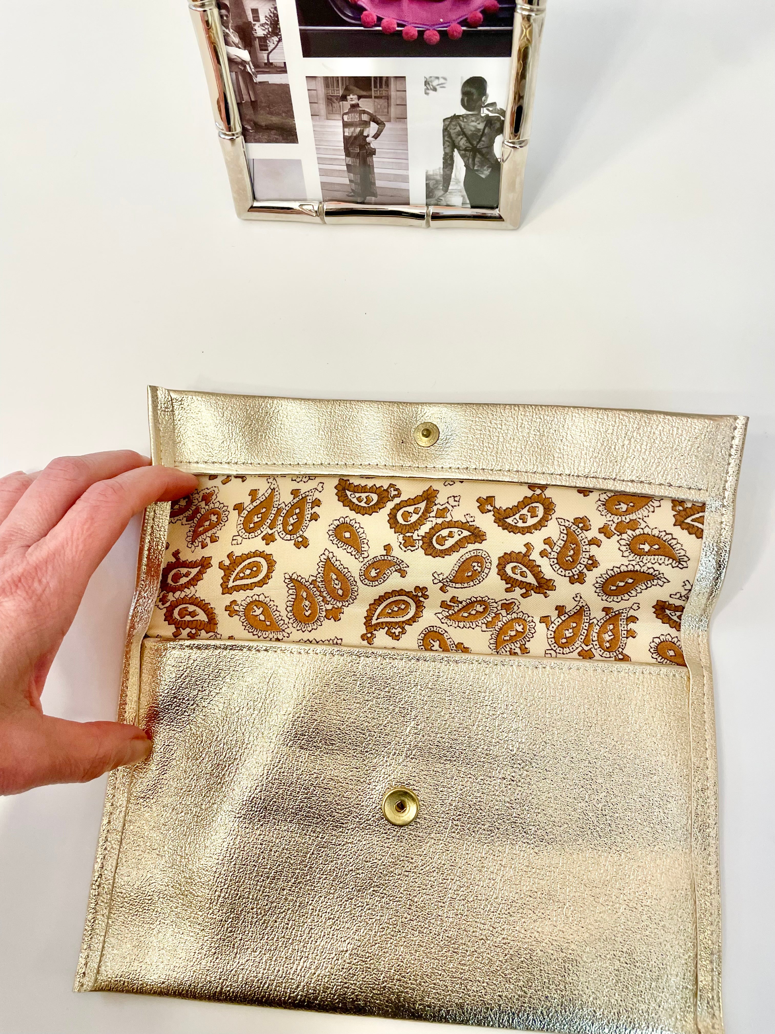 1960's sassy petite gold clutch bag with lovely gold adornment...