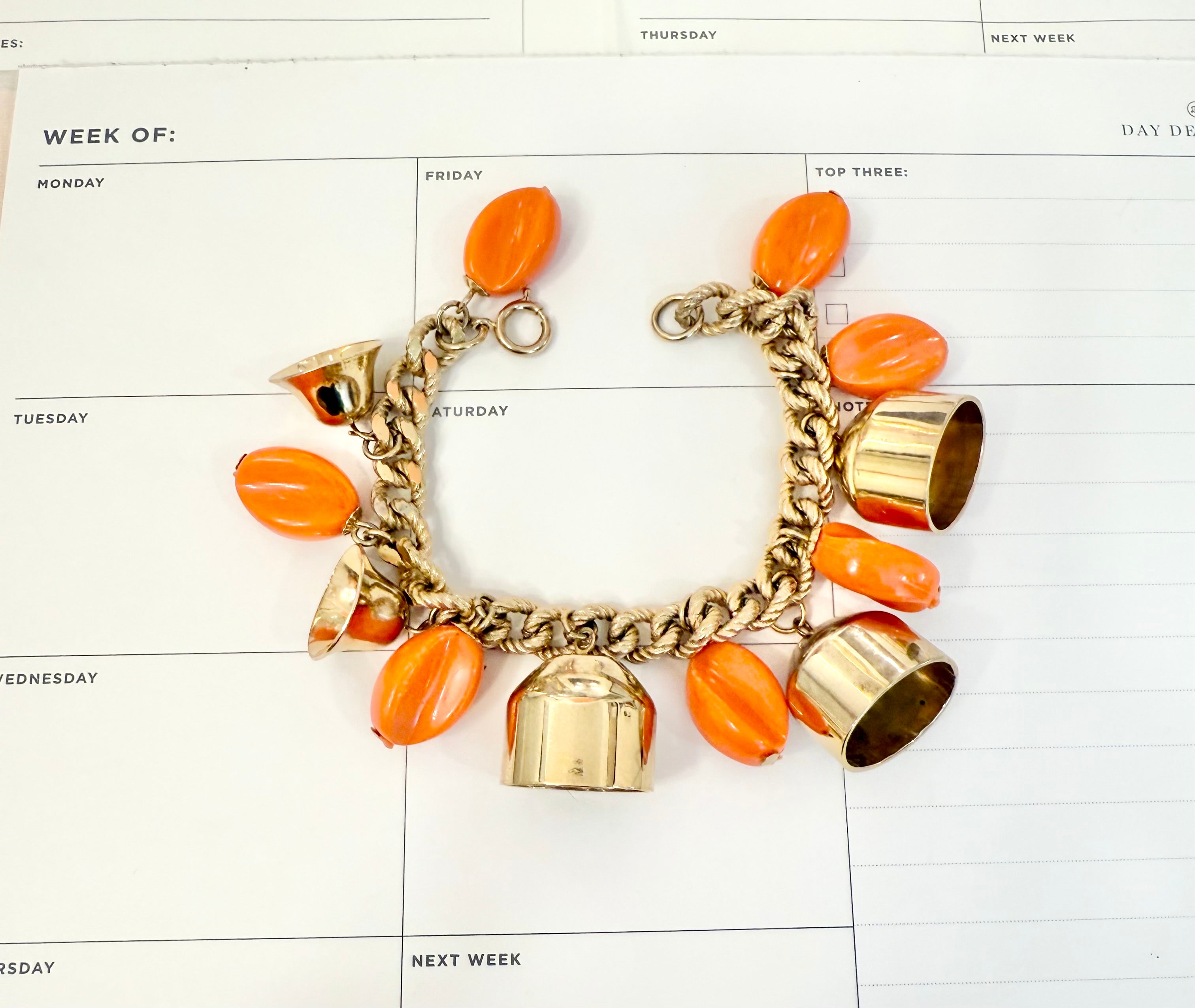 1960's charming gold bell, and orange resin drop bracelet.... so sassy