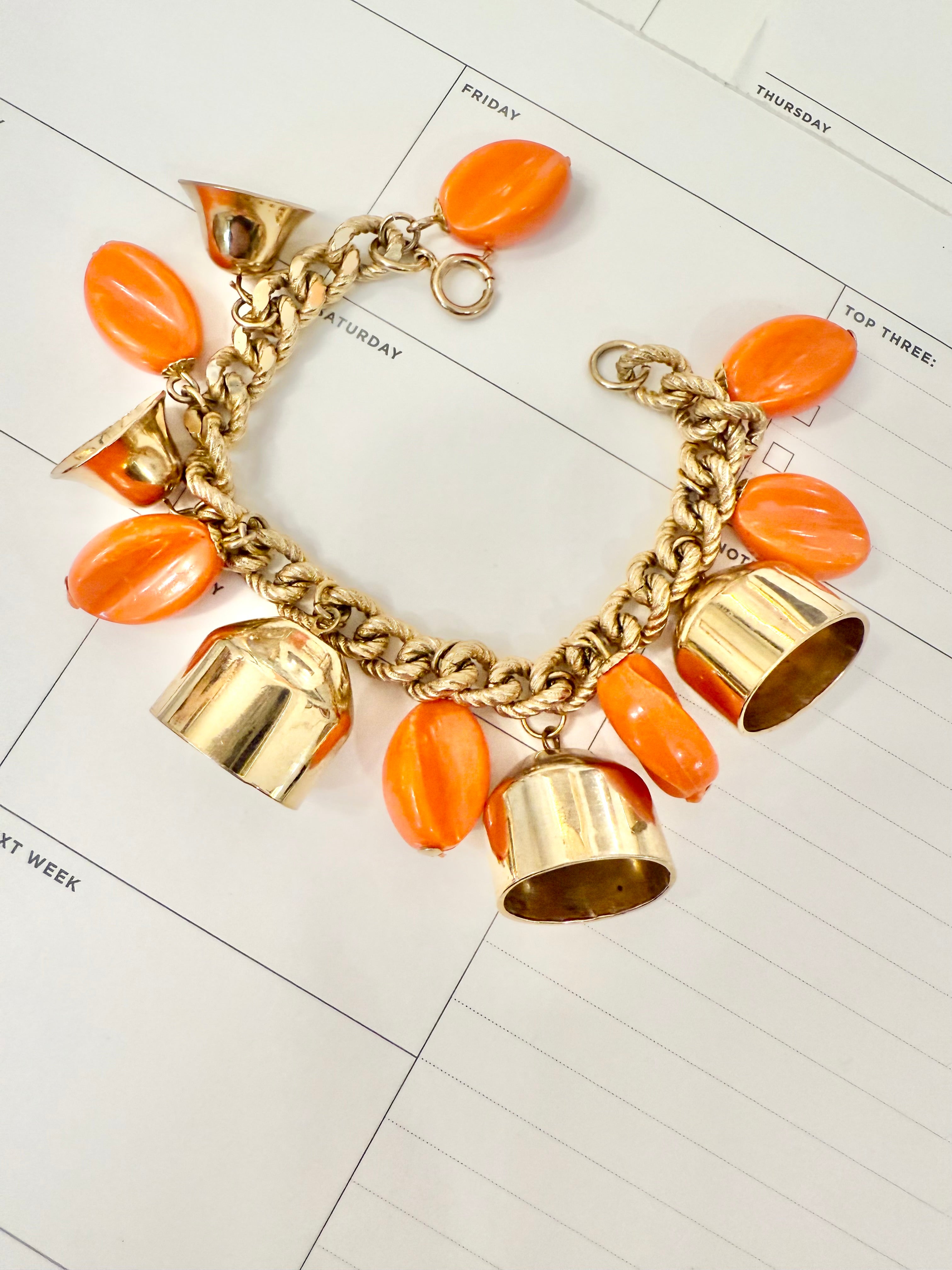 1960's charming gold bell, and orange resin drop bracelet.... so sassy