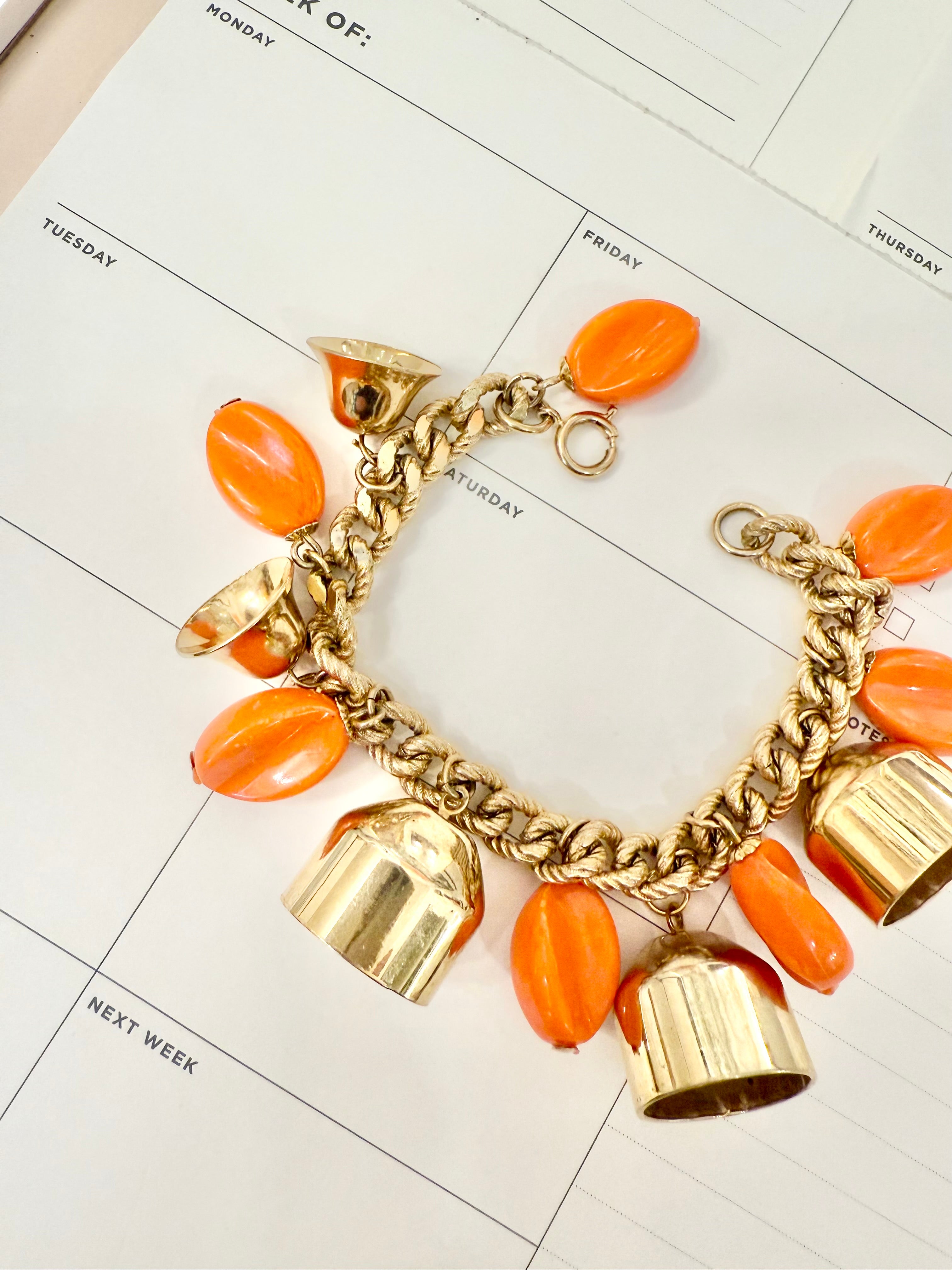 1960's charming gold bell, and orange resin drop bracelet.... so sassy