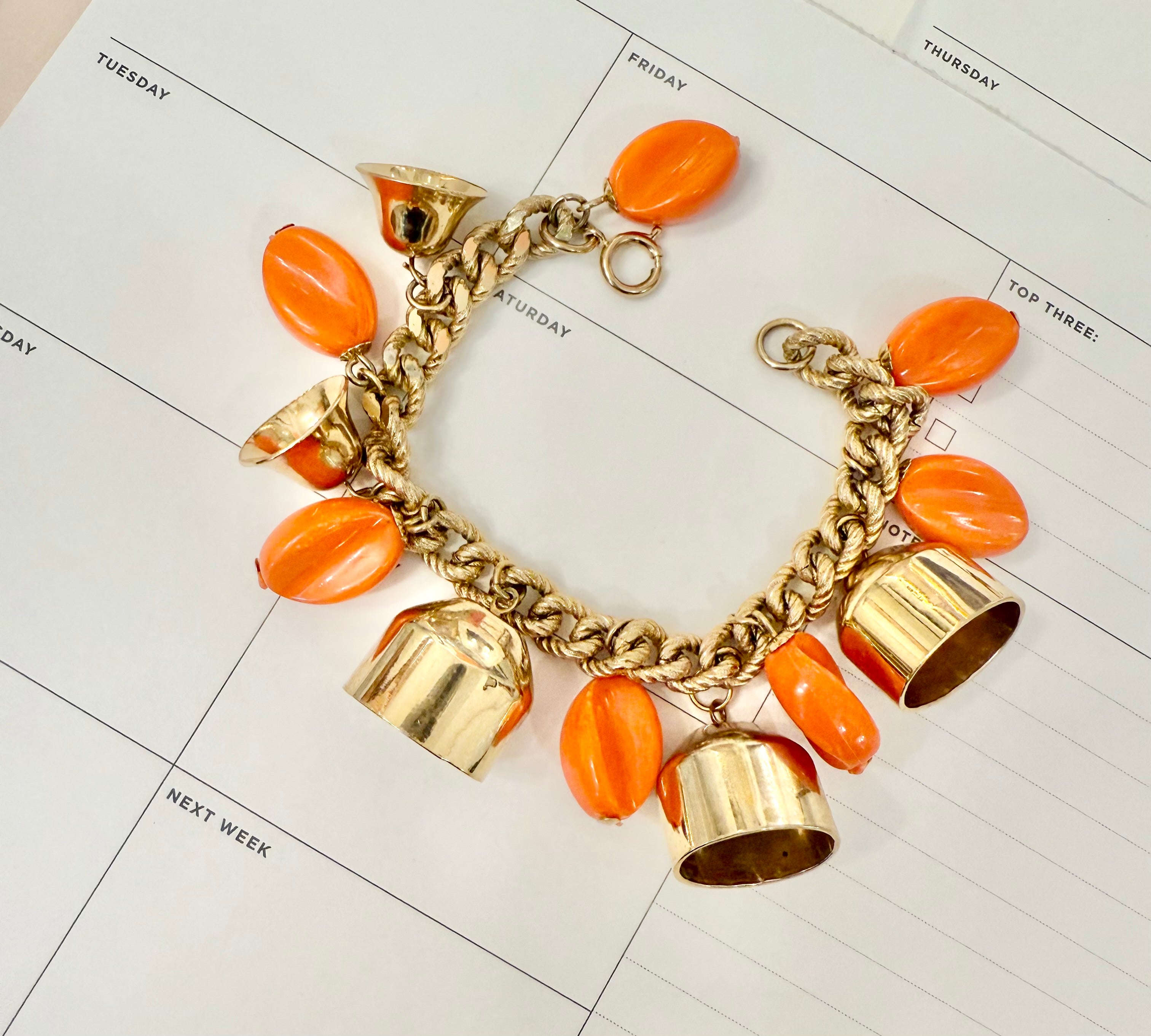 1960's charming gold bell, and orange resin drop bracelet.... so sassy