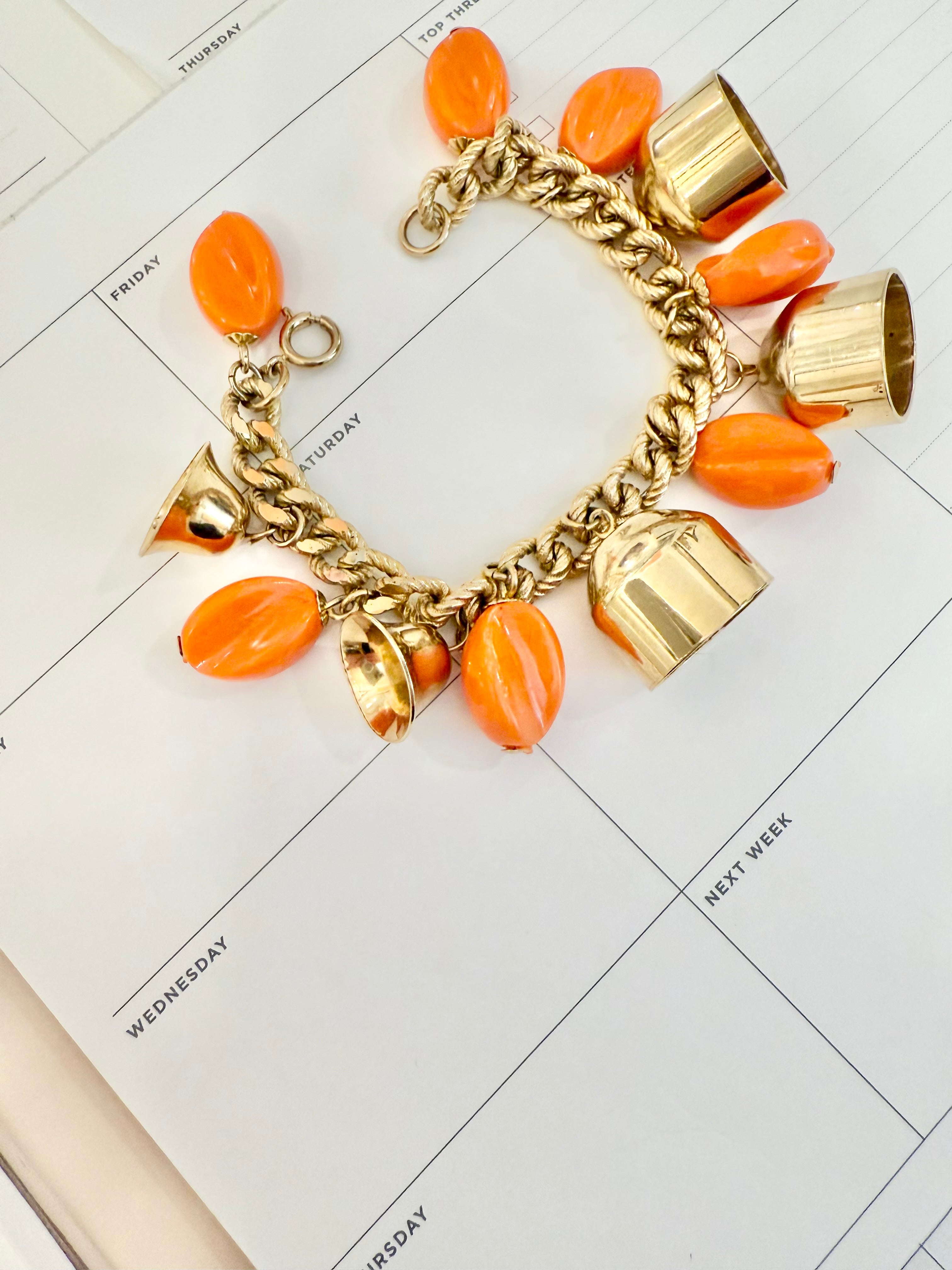 1960's charming gold bell, and orange resin drop bracelet.... so sassy