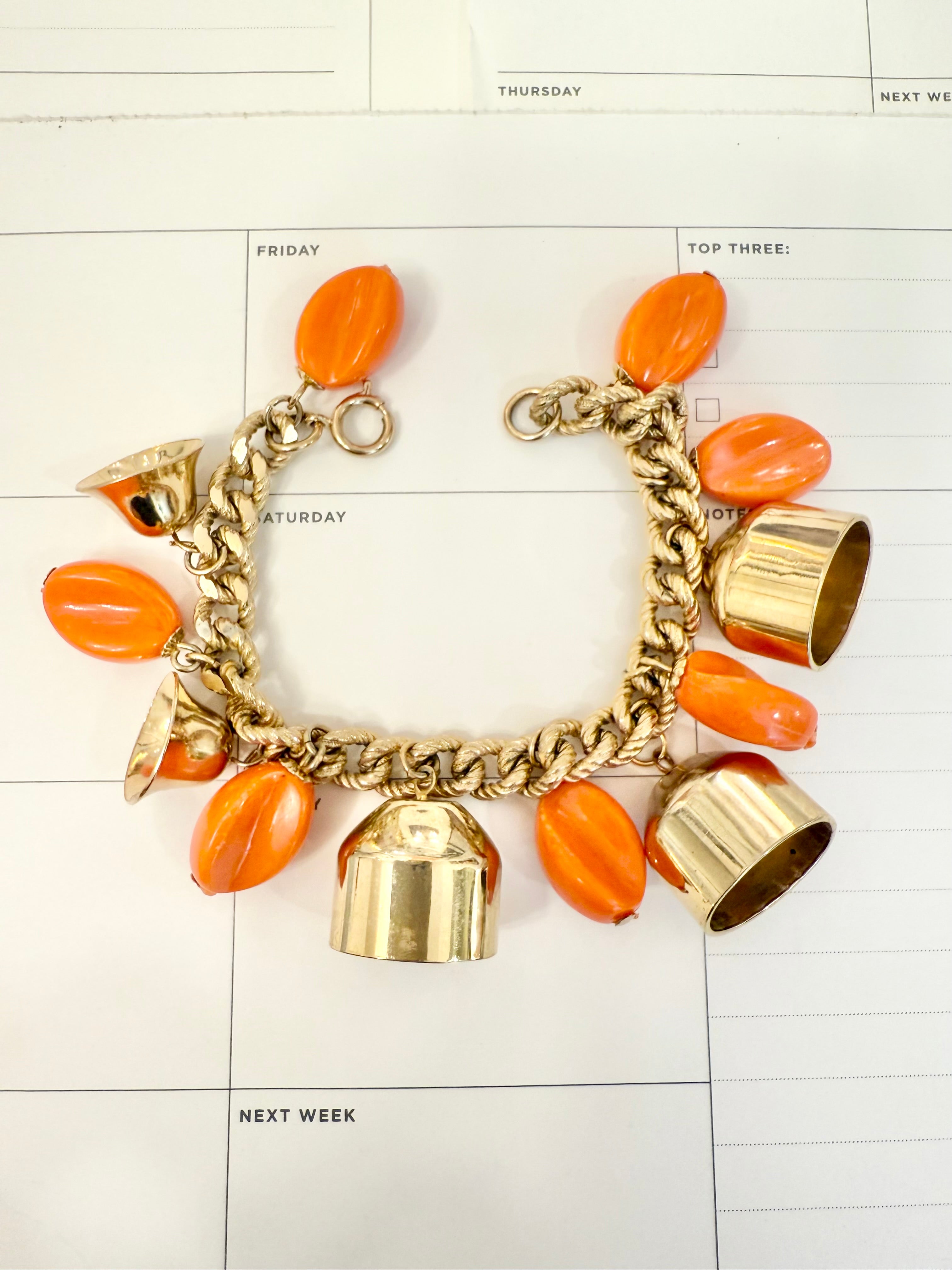 1960's charming gold bell, and orange resin drop bracelet.... so sassy