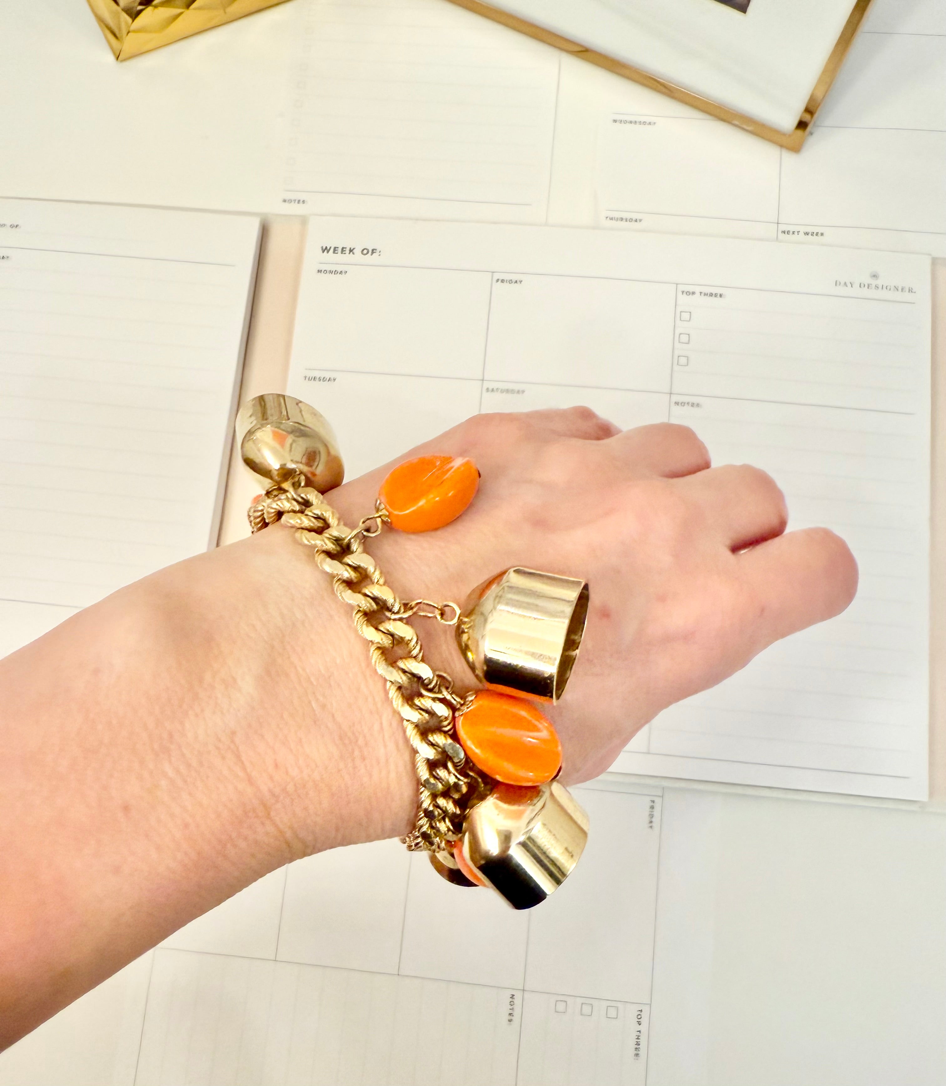 1960's charming gold bell, and orange resin drop bracelet.... so sassy