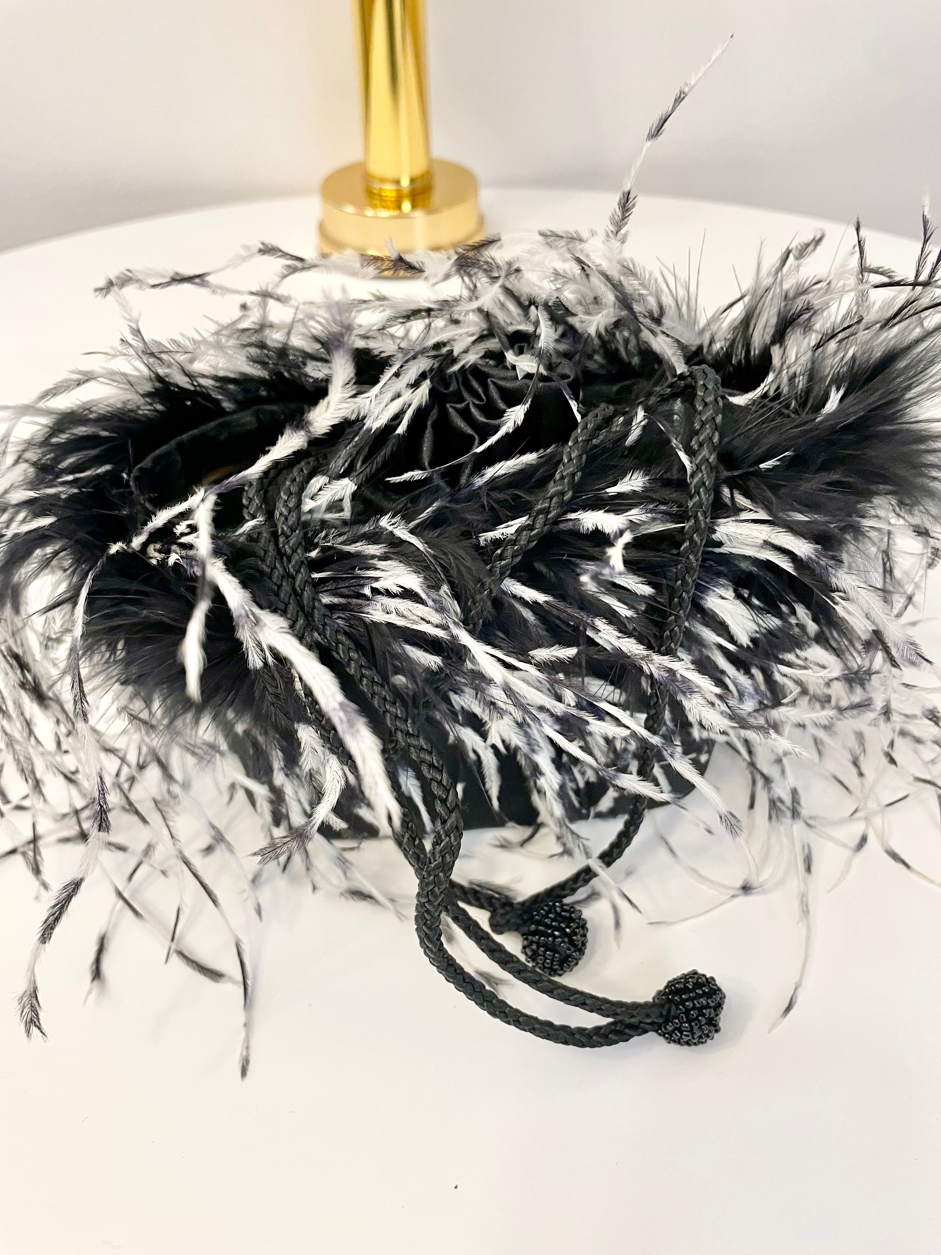 The cutest ostrich feather box bag.... so sassy