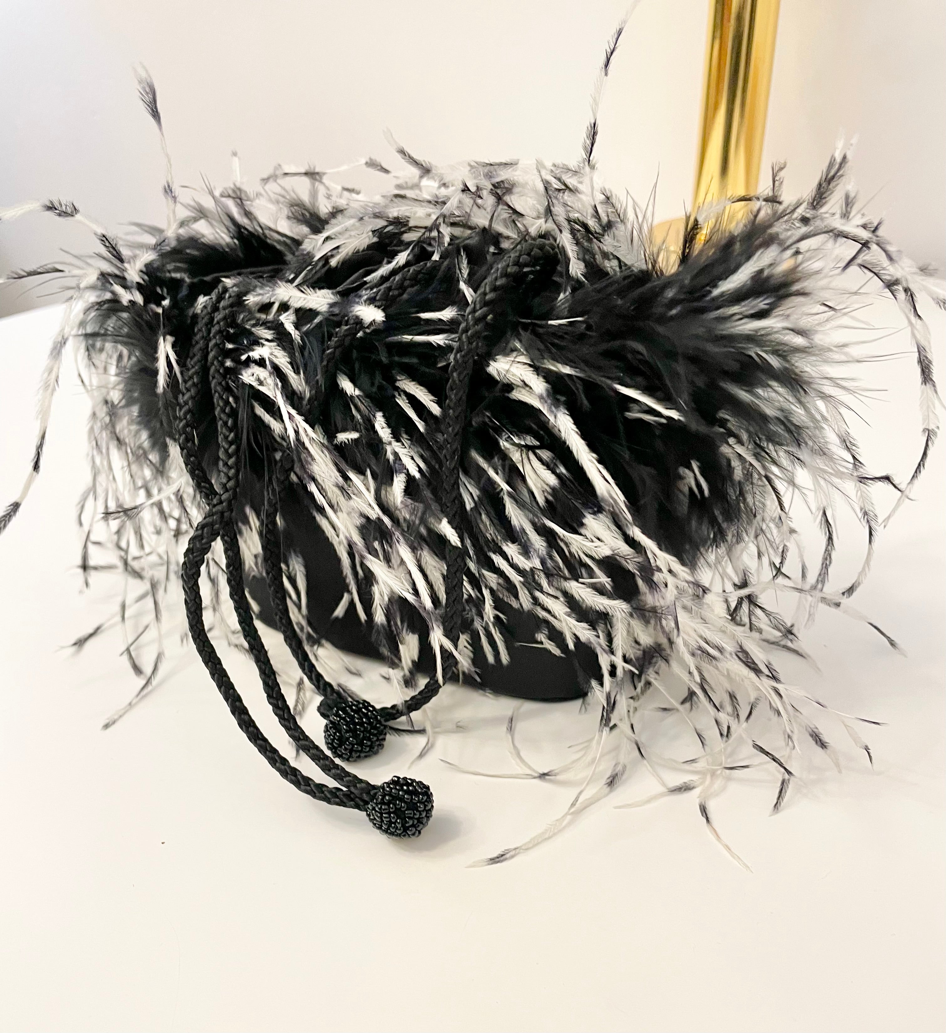 The cutest ostrich feather box bag.... so sassy