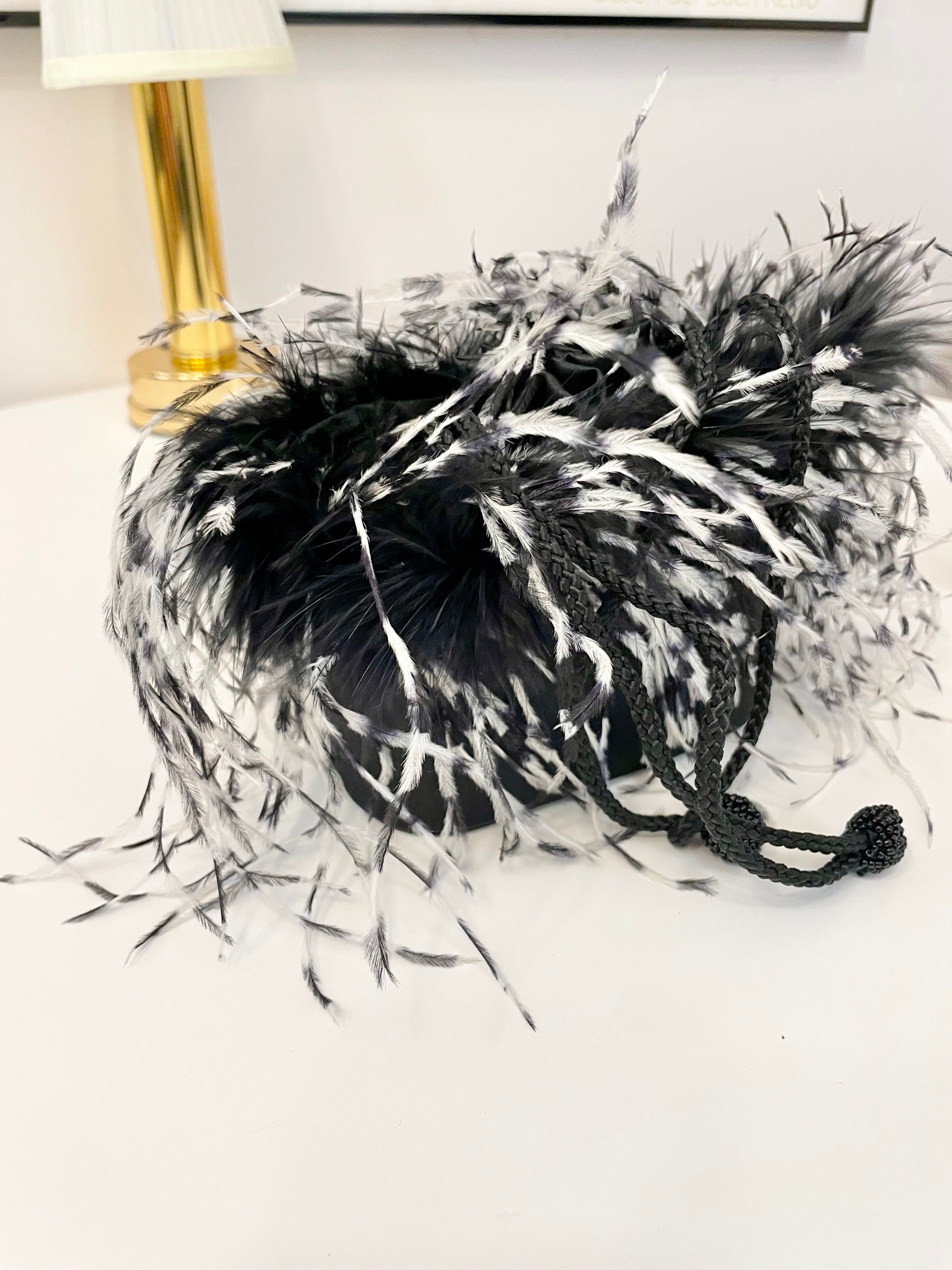 The cutest ostrich feather box bag.... so sassy