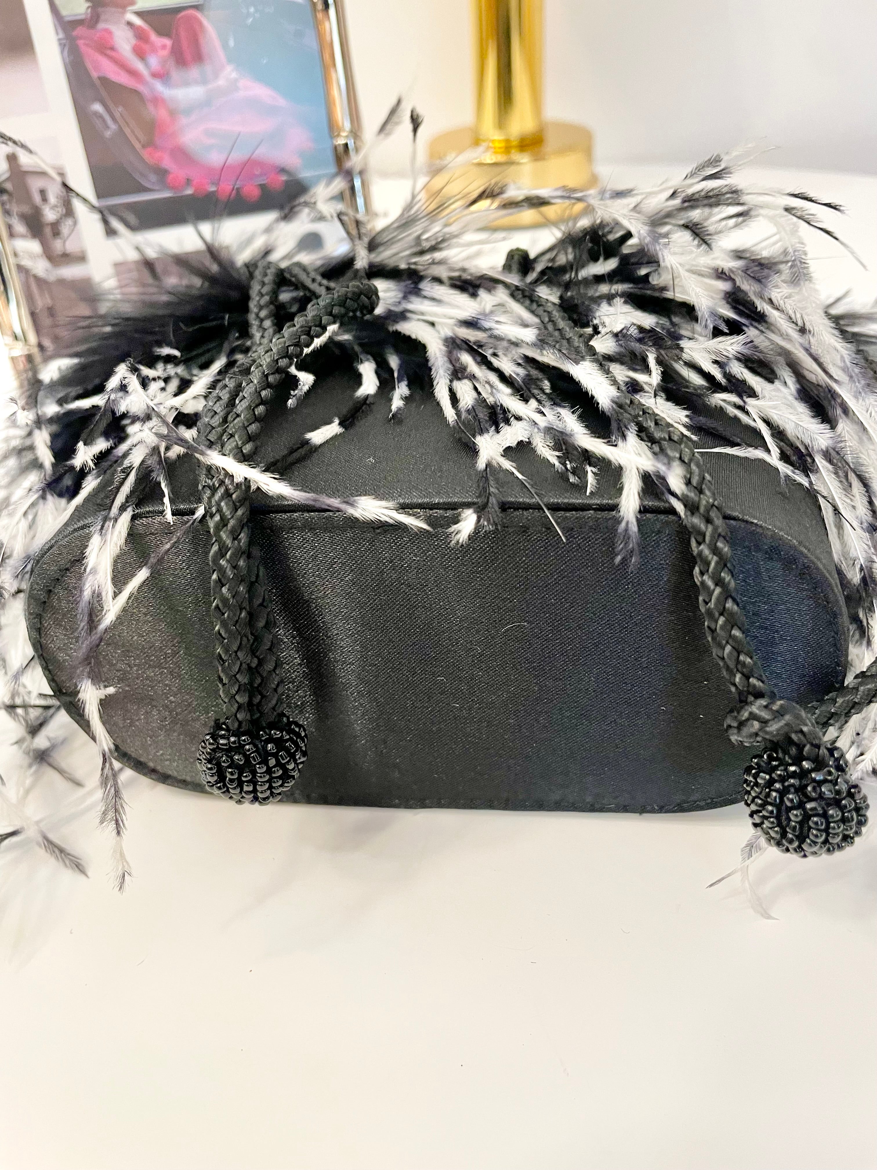 The cutest ostrich feather box bag.... so sassy