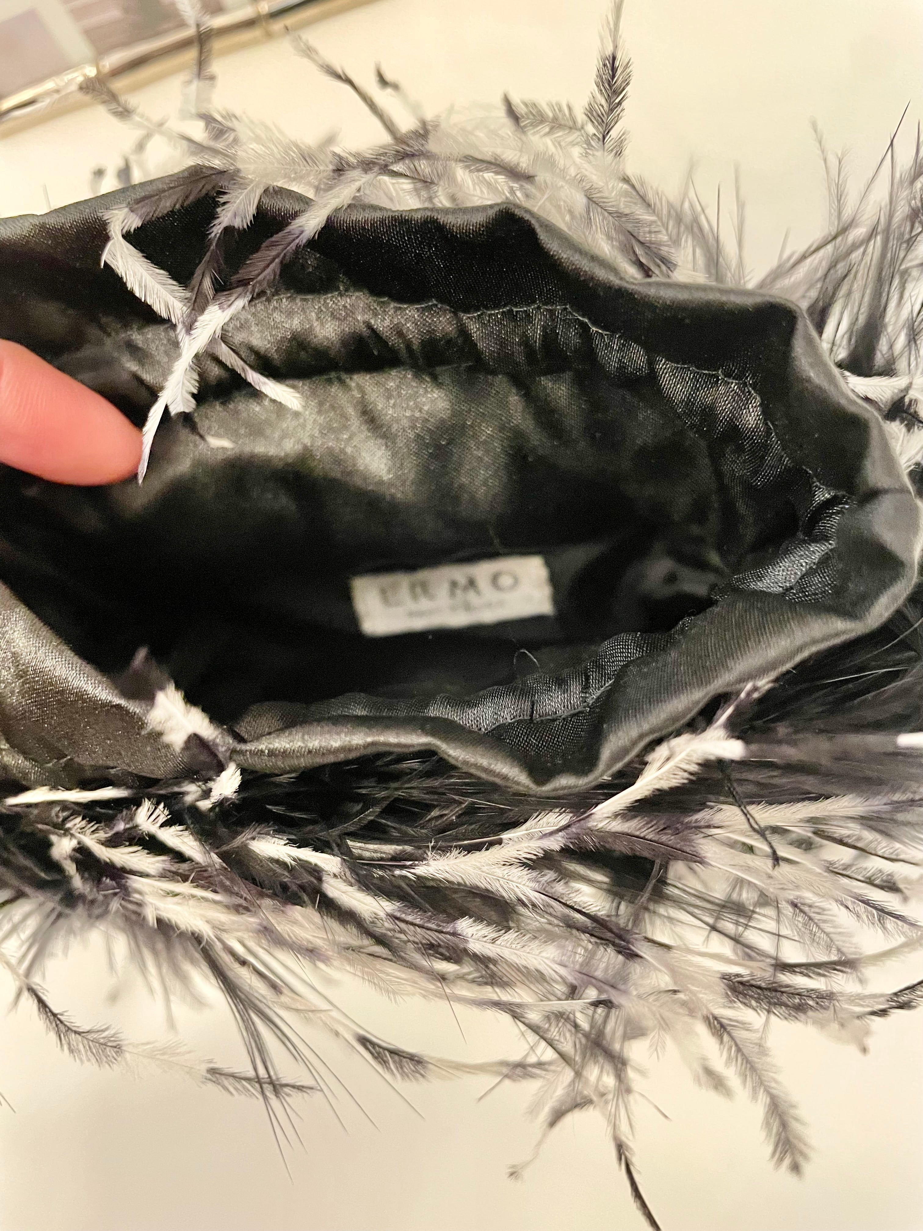 The cutest ostrich feather box bag.... so sassy