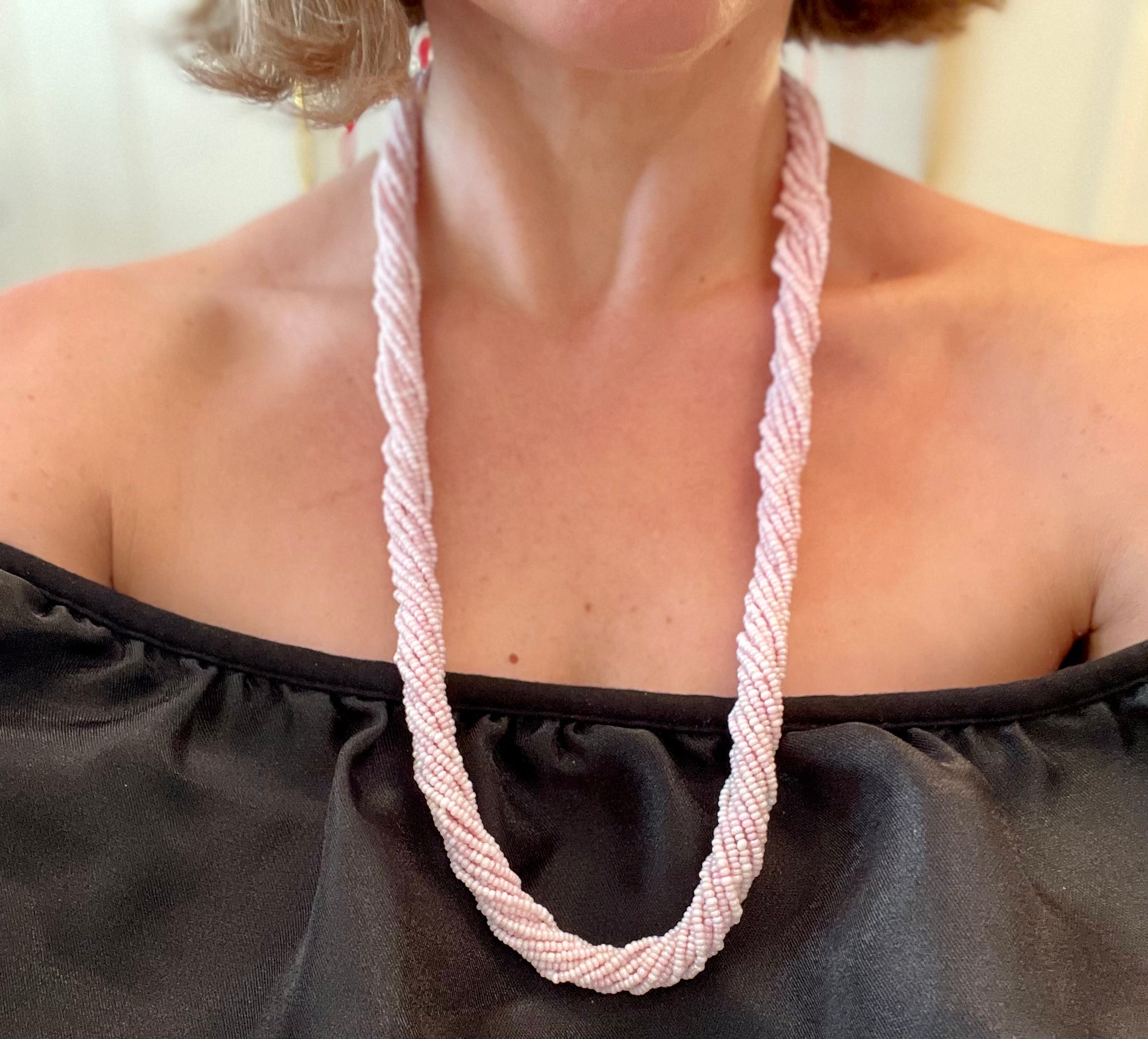 The Flirty gal and her love of pink! This 1970's soft pink beaded necklace is truly elegant.