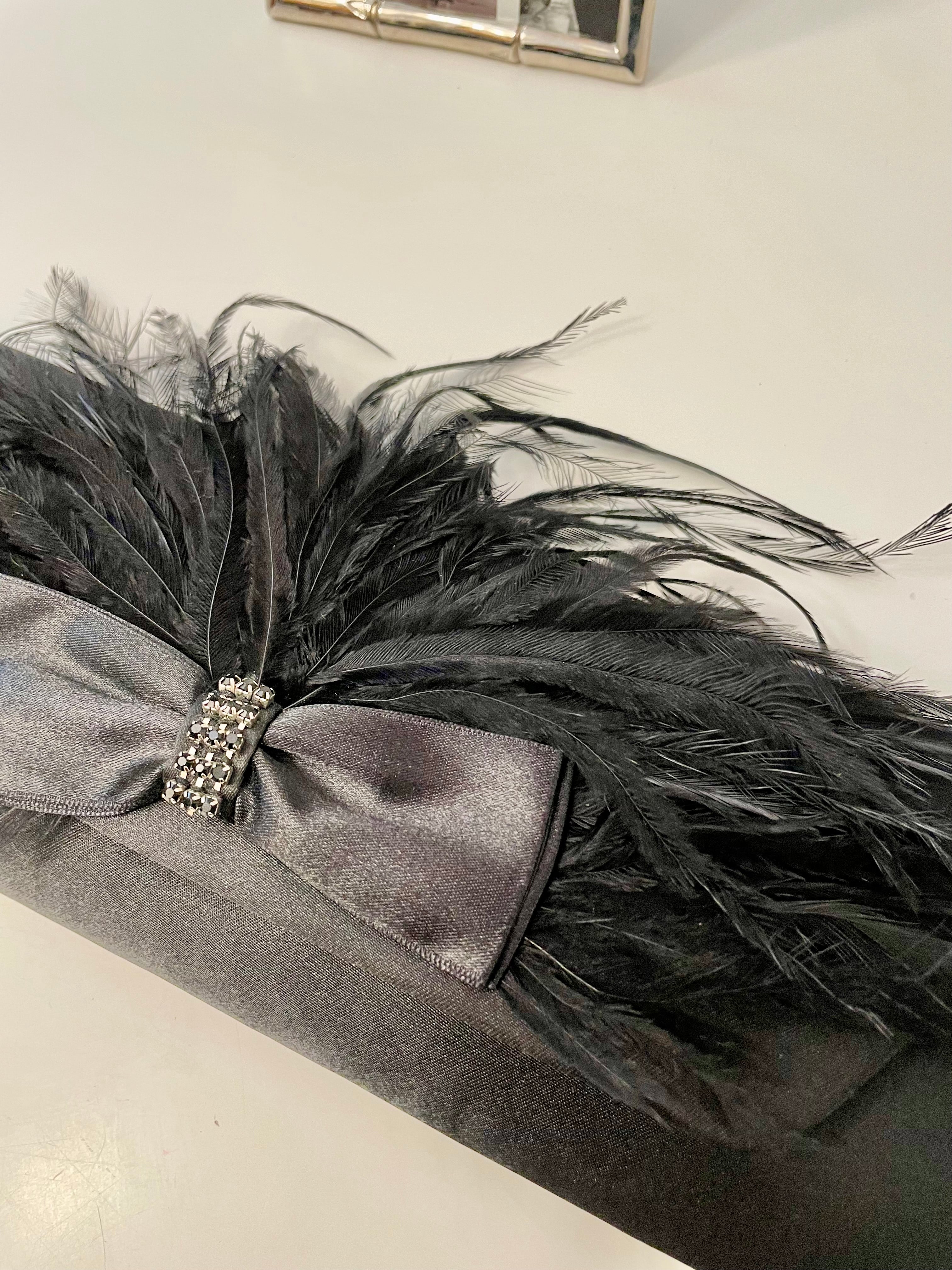 The most lovely noir bow bag with a dusting of feathers....