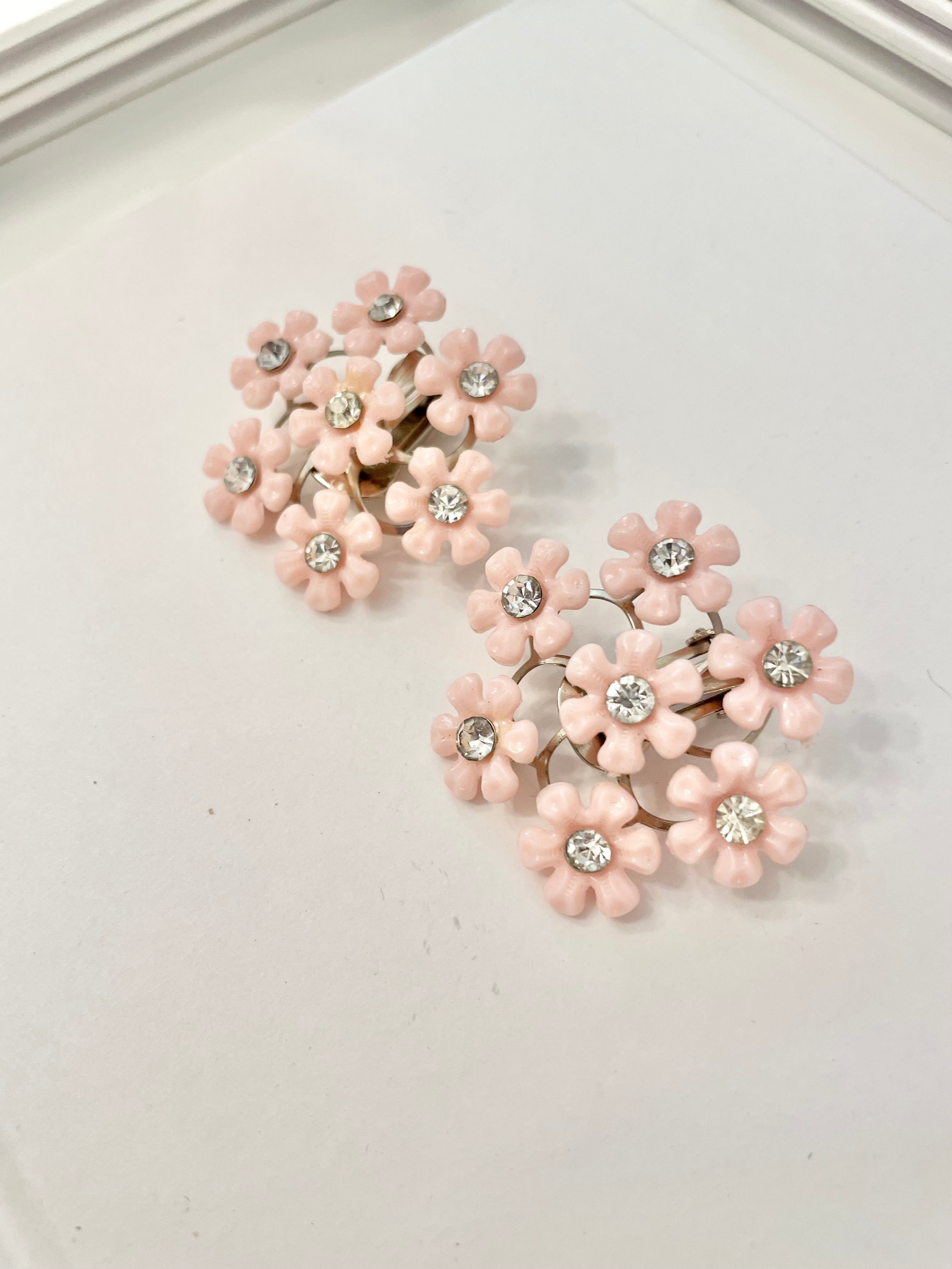 The flirty gal and her love of pink.. these 1960's feminine soft pink flowers are truly divine!