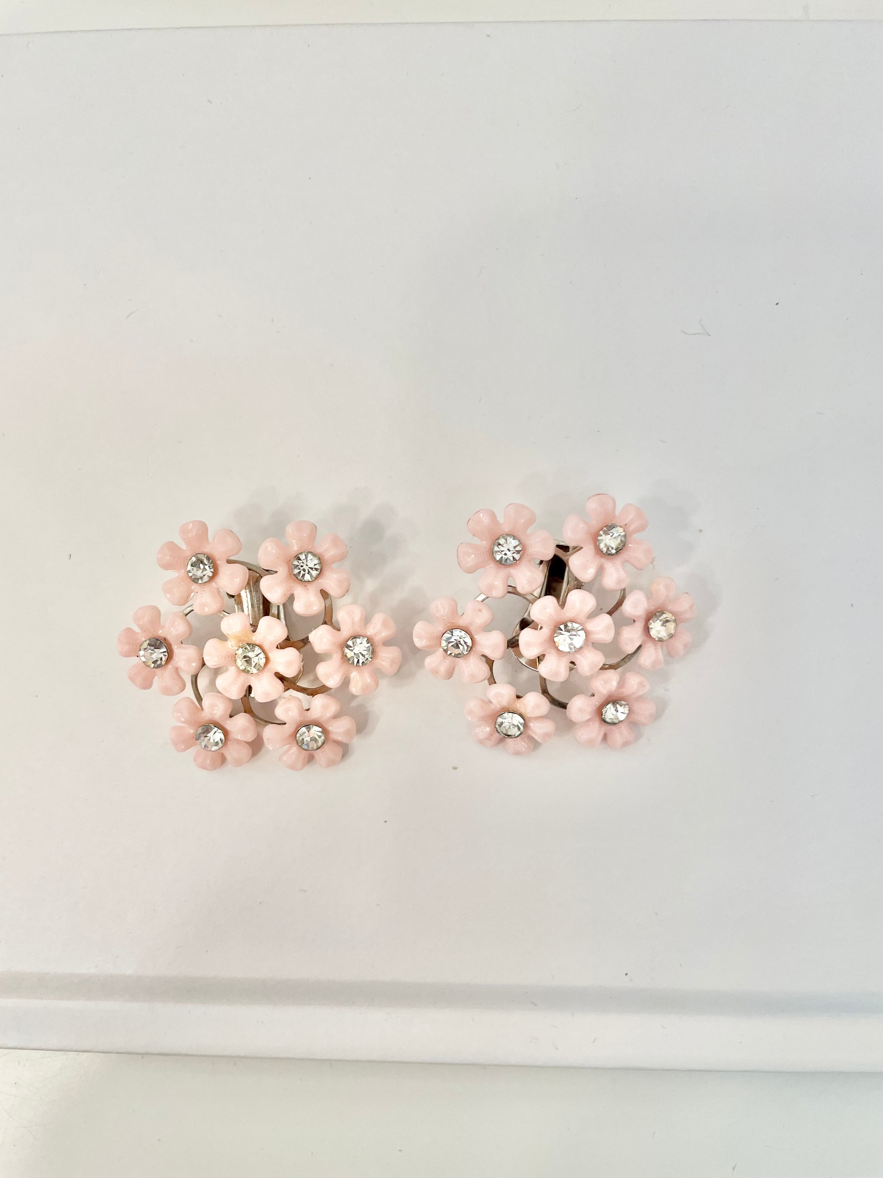 The flirty gal and her love of pink.. these 1960's feminine soft pink flowers are truly divine!