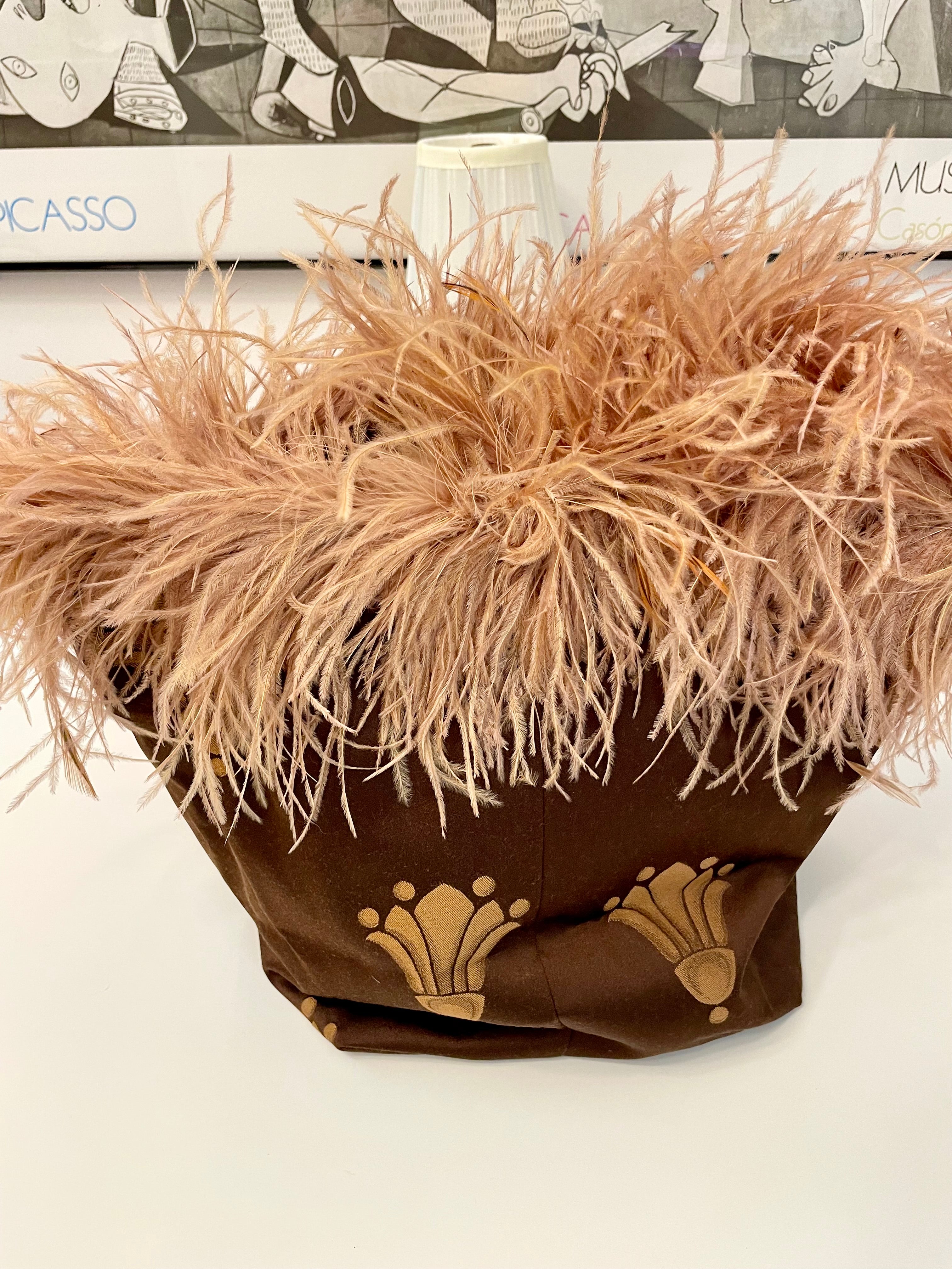 The most playful, and feminine feather bag.... so darling