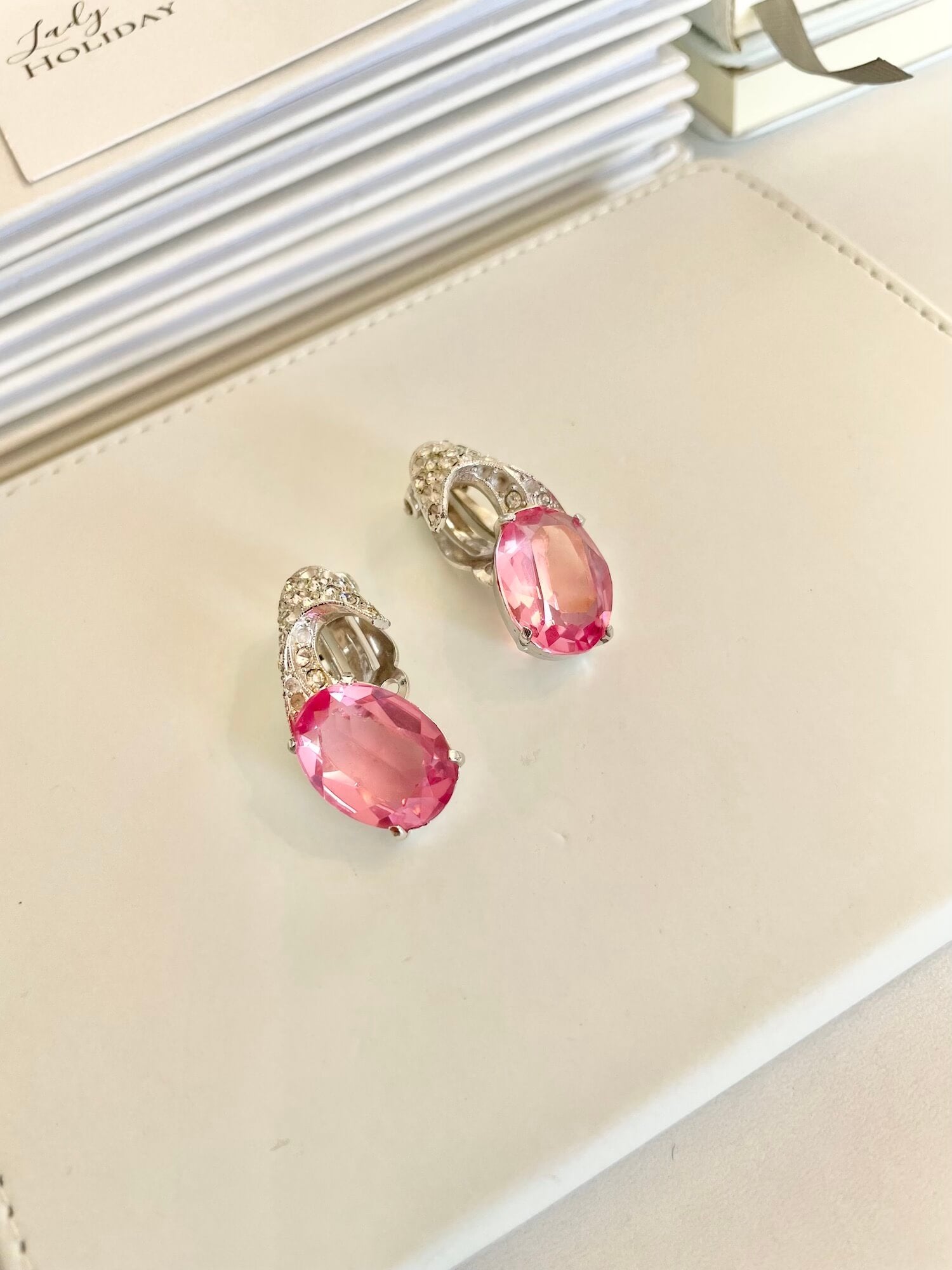 Vintage 1950's cut pink glass stunners, with a dusting of pave set stones. so divine