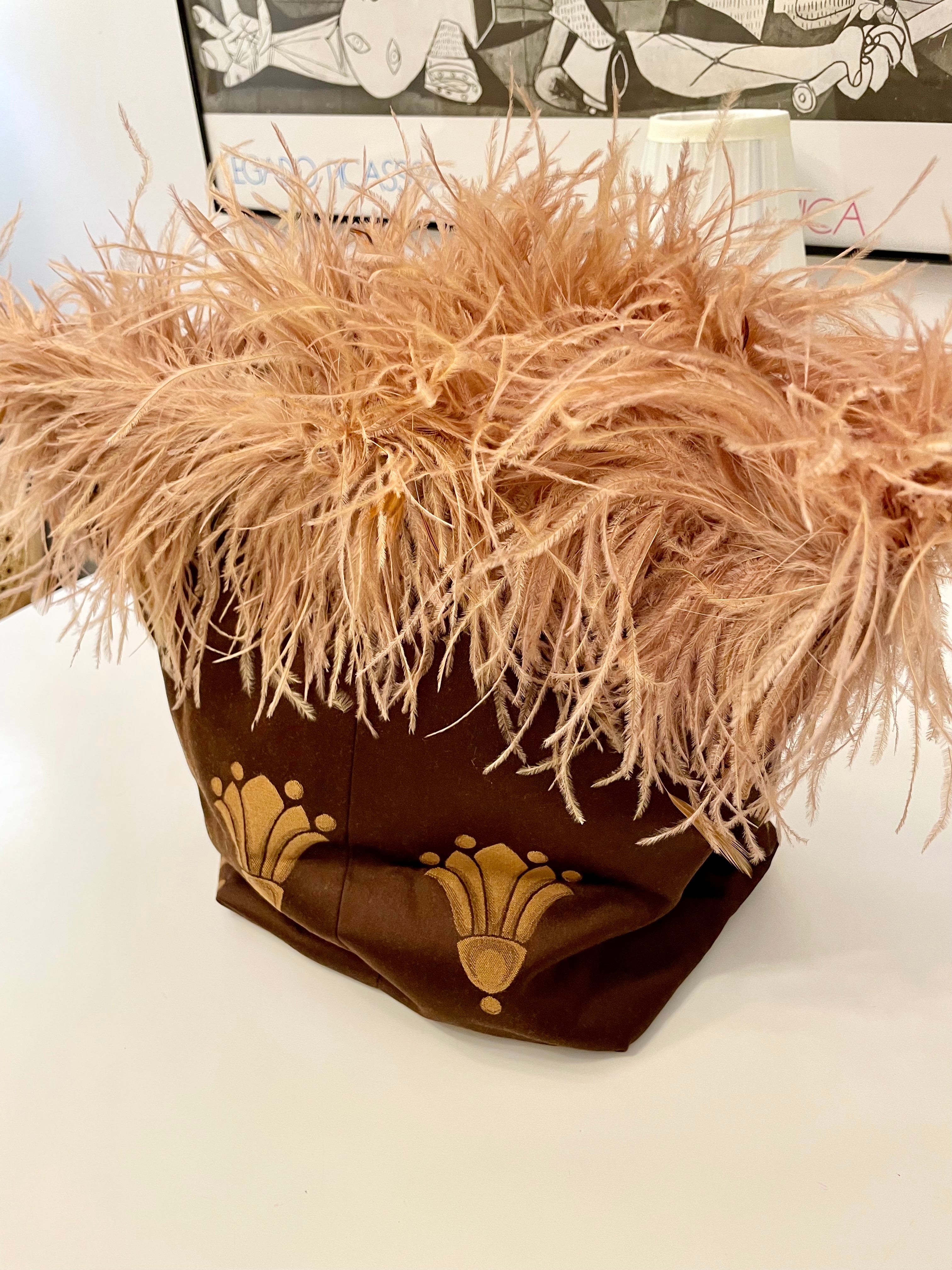 The most playful, and feminine feather bag.... so darling