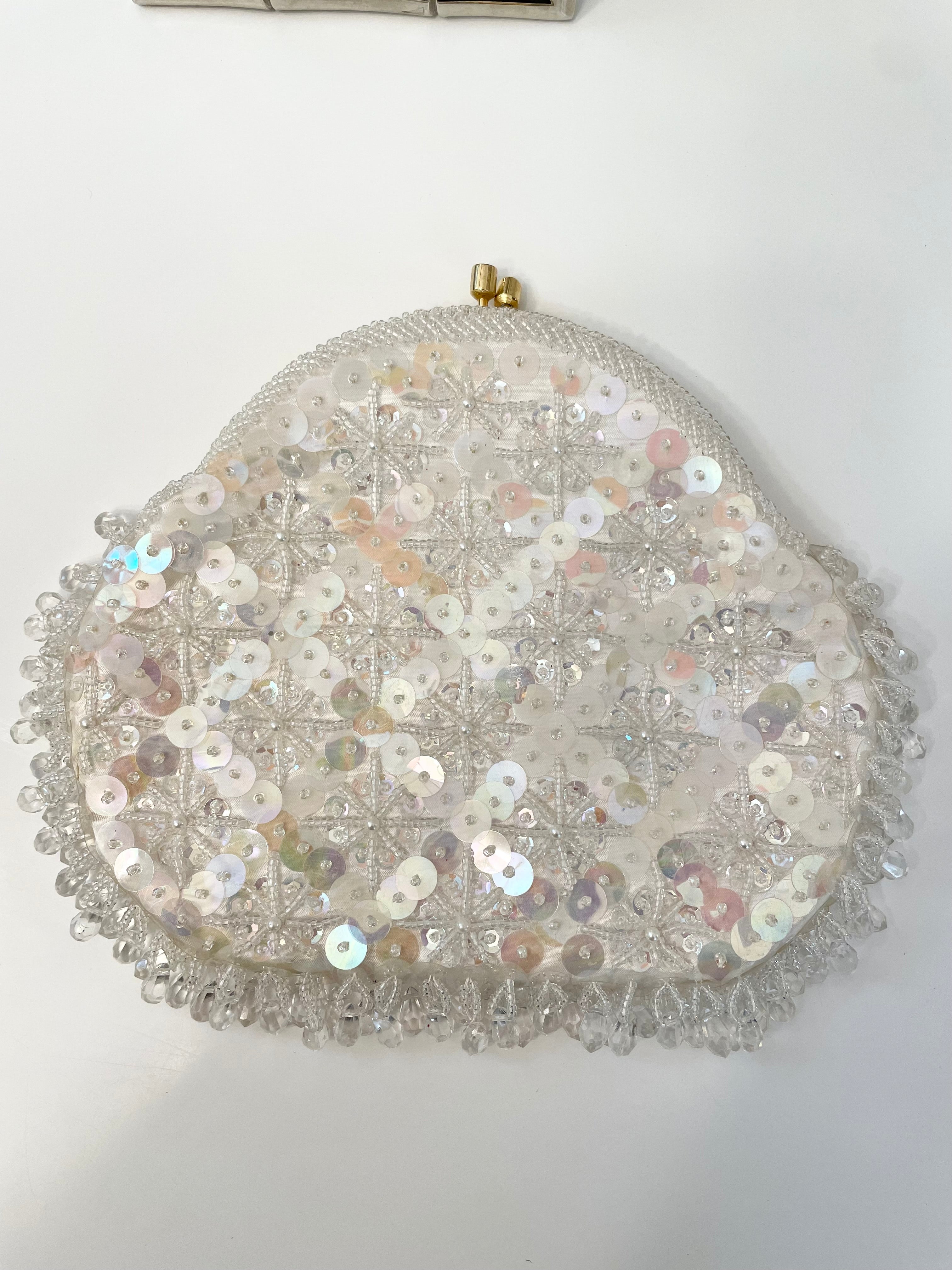 1960's charming ivory satin cha cha bag....